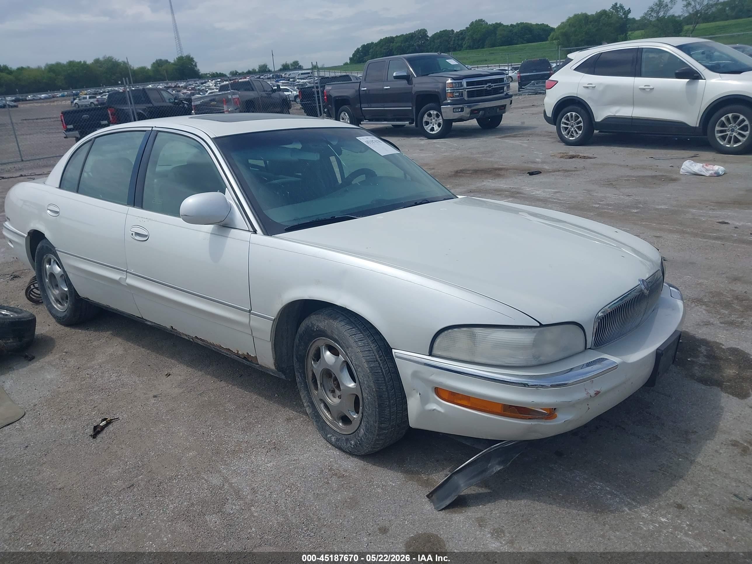 1999 Buick Park Avenue Ultra, VIN 1G4CU5214X4626668 — Side