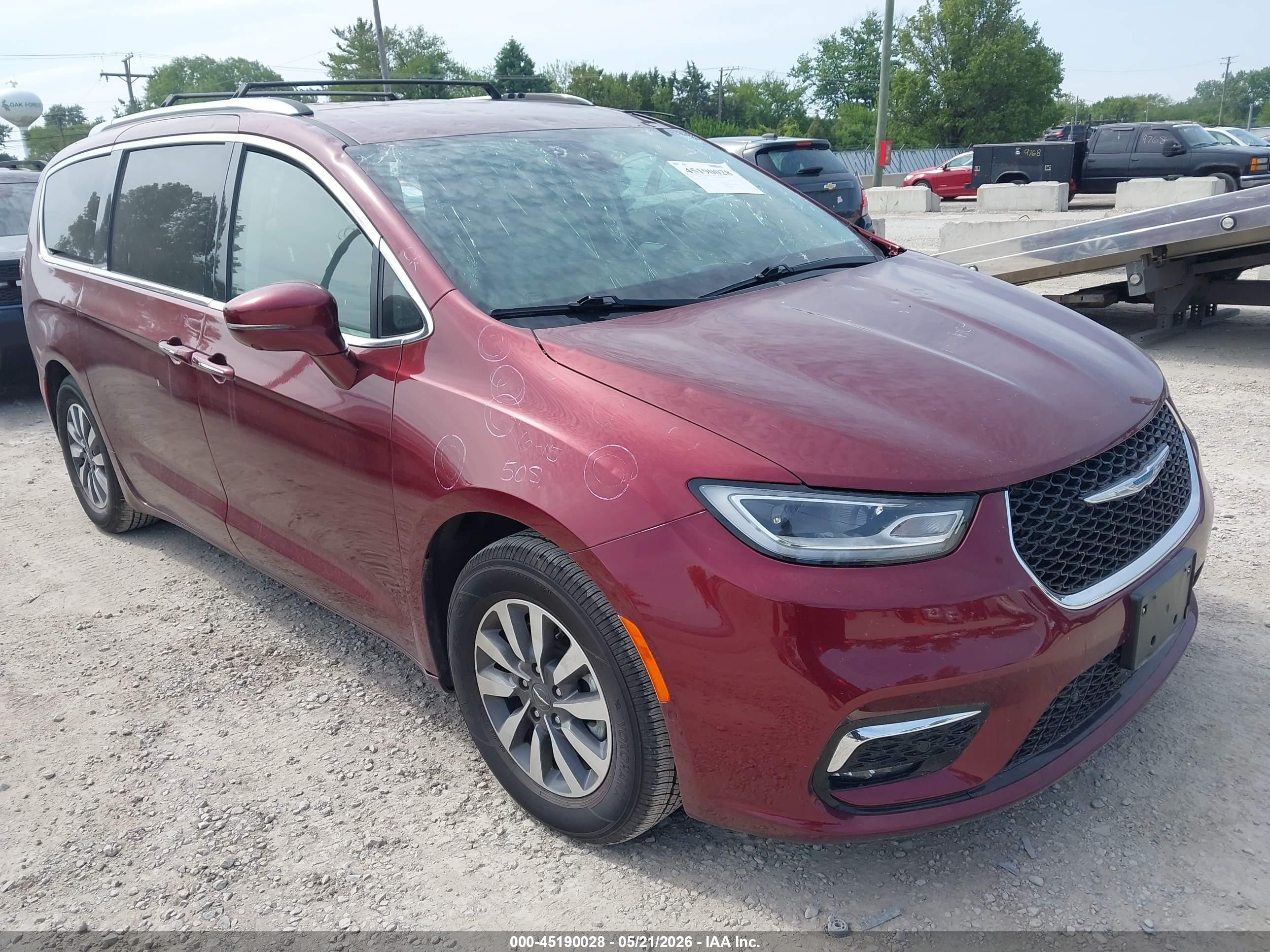 2021 Chrysler Pacifica Hybrid Touring L, VIN 2C4RC1L73MR606191 — Hail