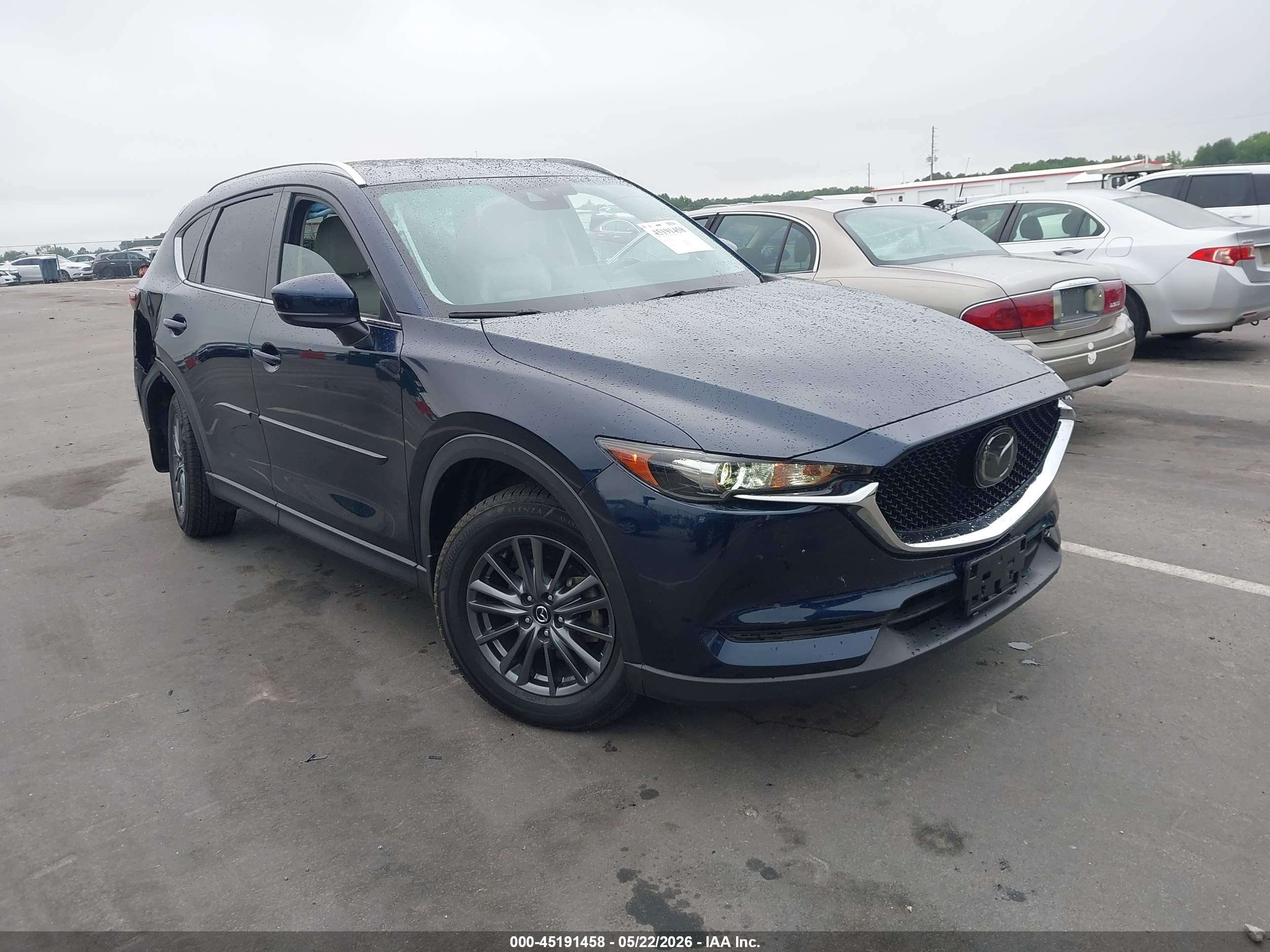 2021 Mazda CX-5 Touring, VIN JM3KFACM6M0350726 — Rear end
