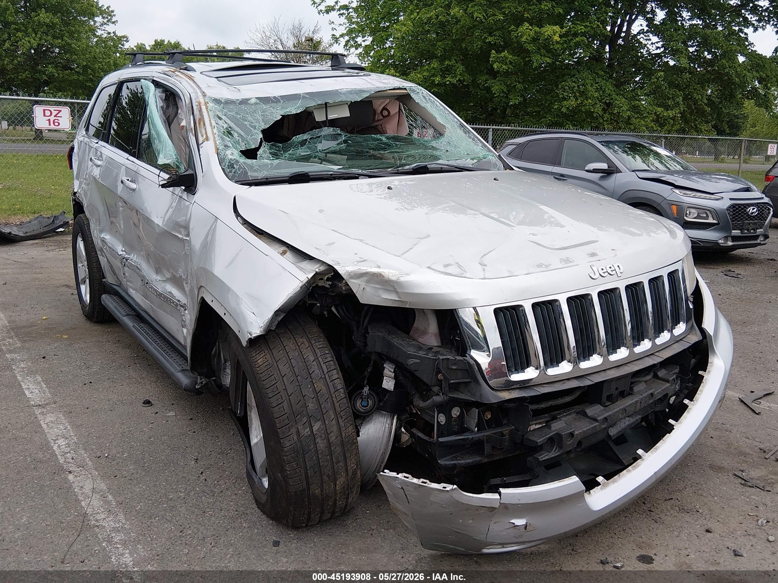 2013 Jeep Grand Cherokee Laredo, VIN 1C4RJFAG9DC620787 — Rollover