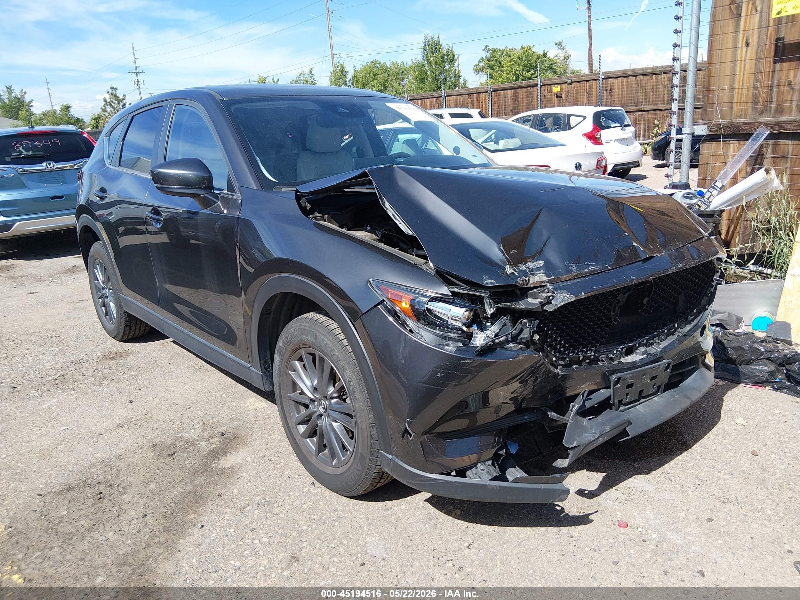 2021 Mazda CX-5 Touring, VIN JM3KFBCM1M1370107 — Front end