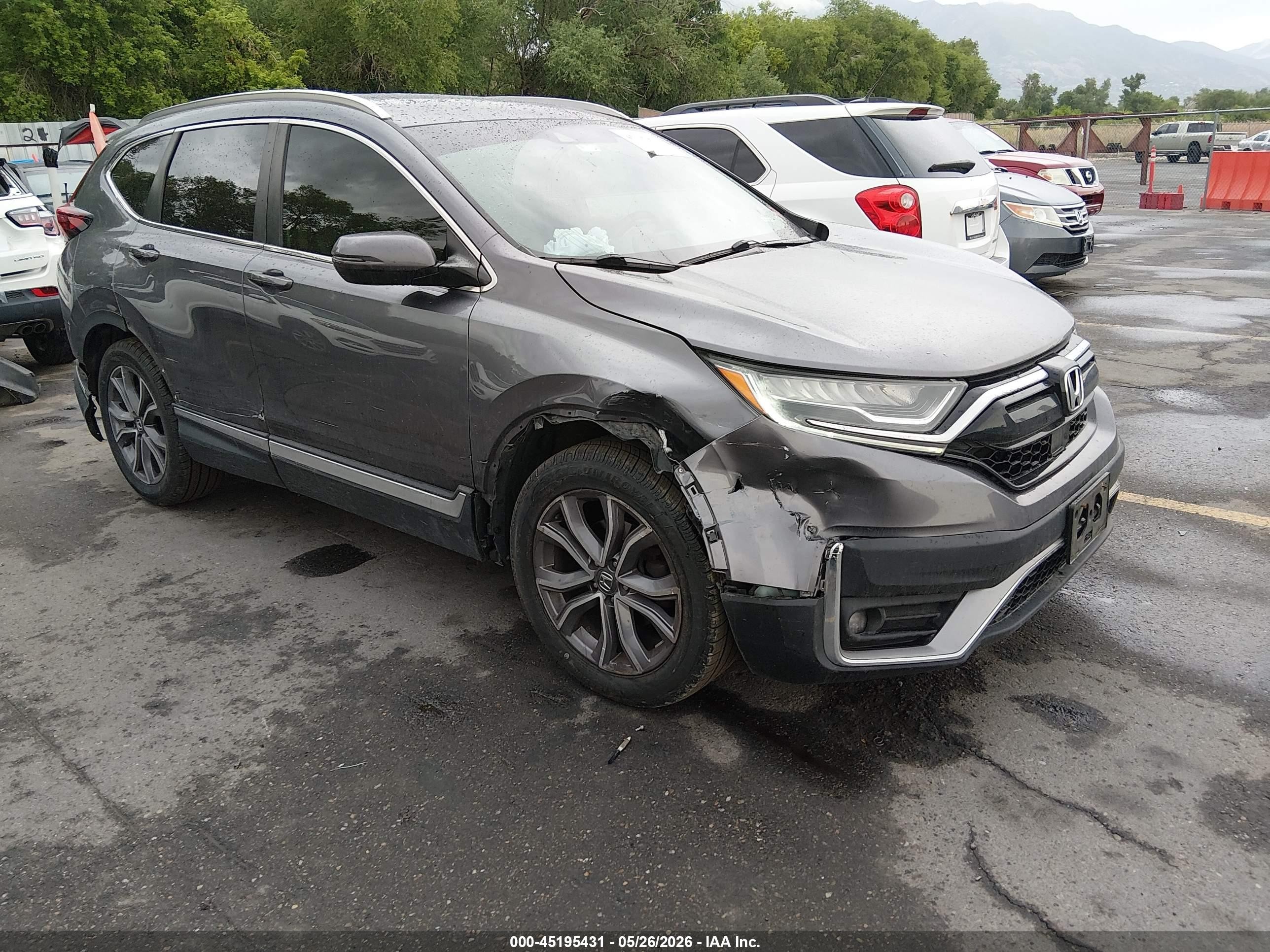 2020 Honda CR-V Touring, VIN 7FARW1H92LE013423 — Side