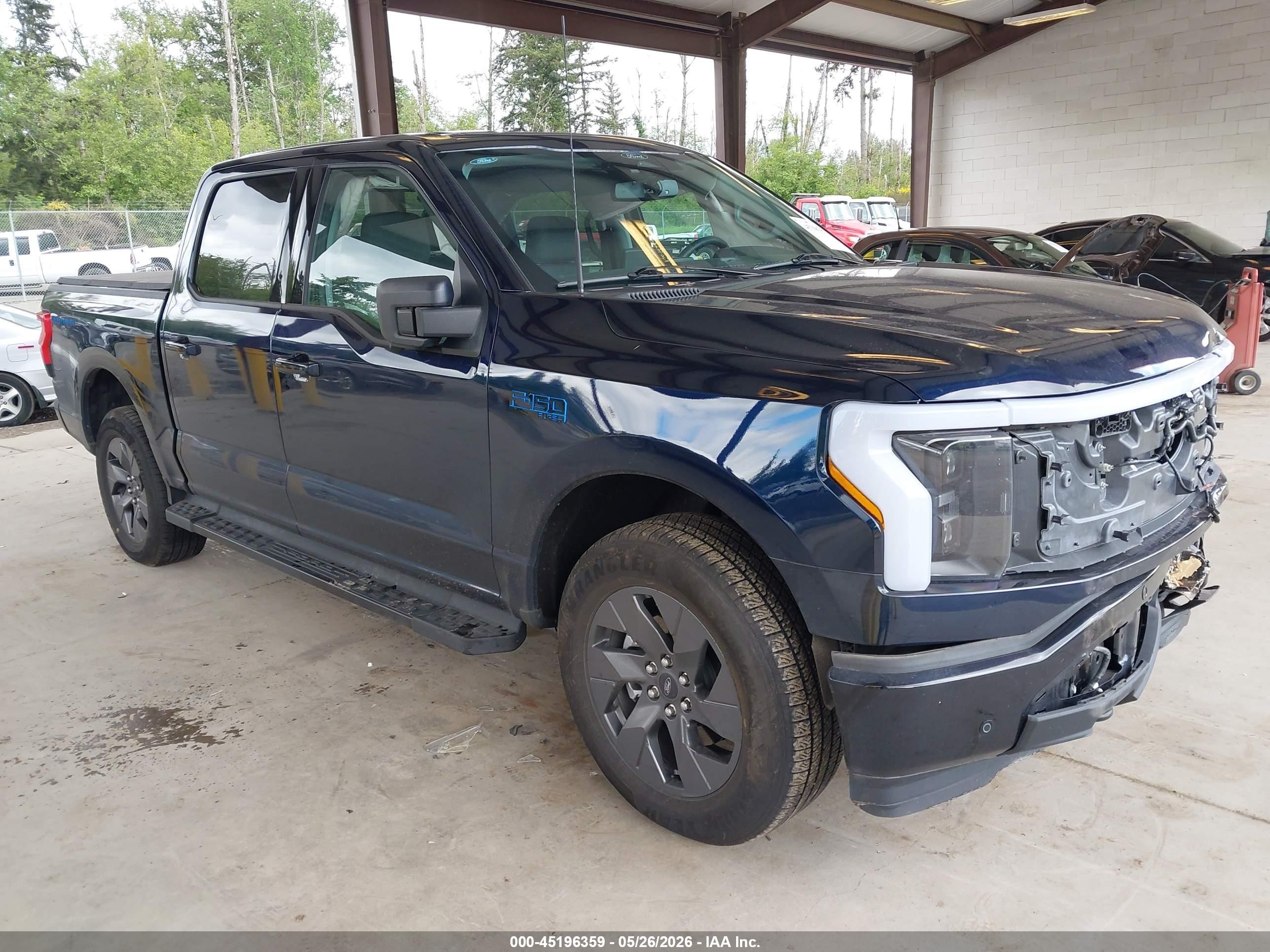 2024 Ford F-150 Lightning Flash, VIN 1FT6W3L77RWG11365 — Front end