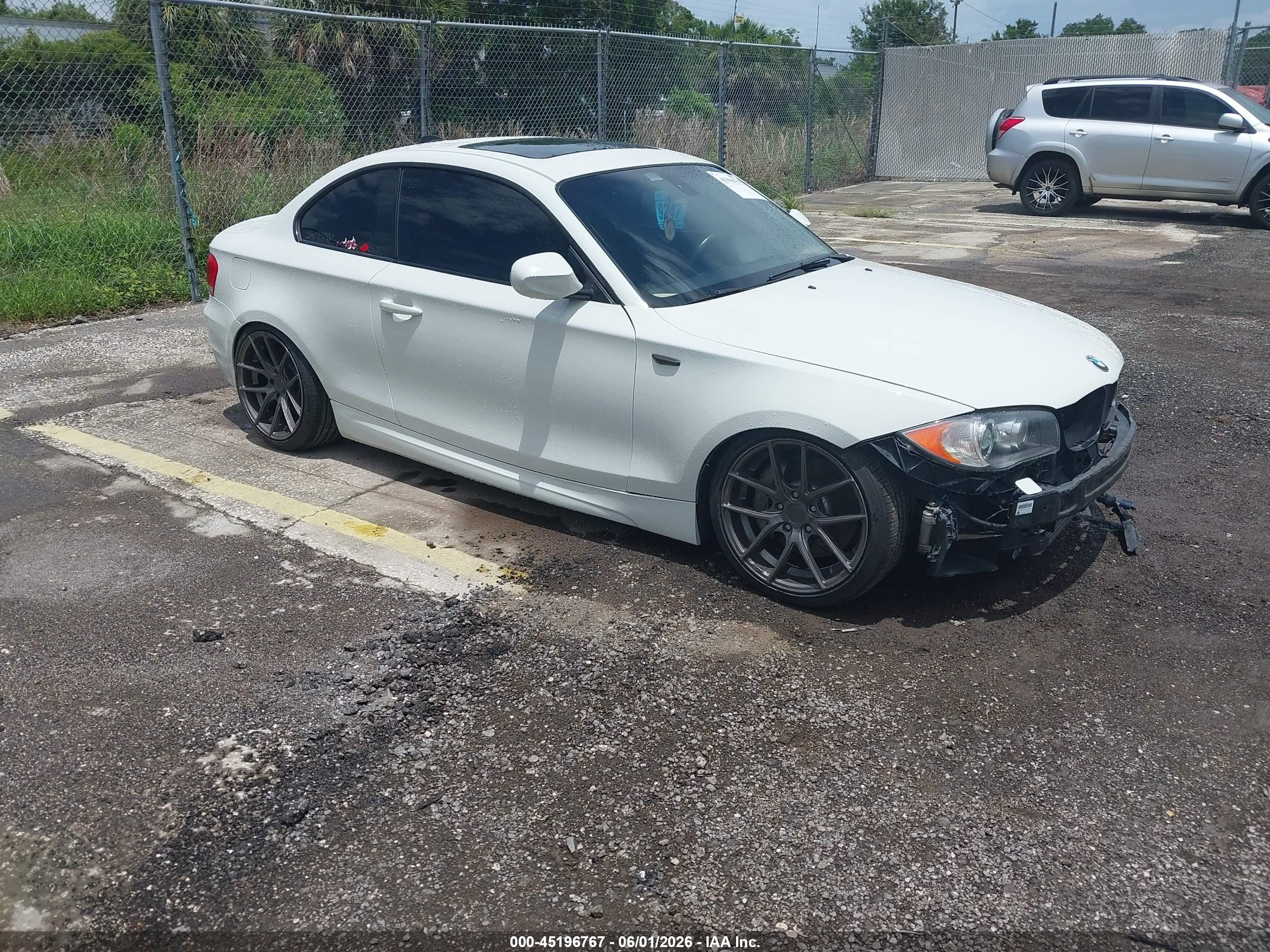 2011 BMW 1 Series 135i, VIN WBAUC9C50BVM09655 — Front end