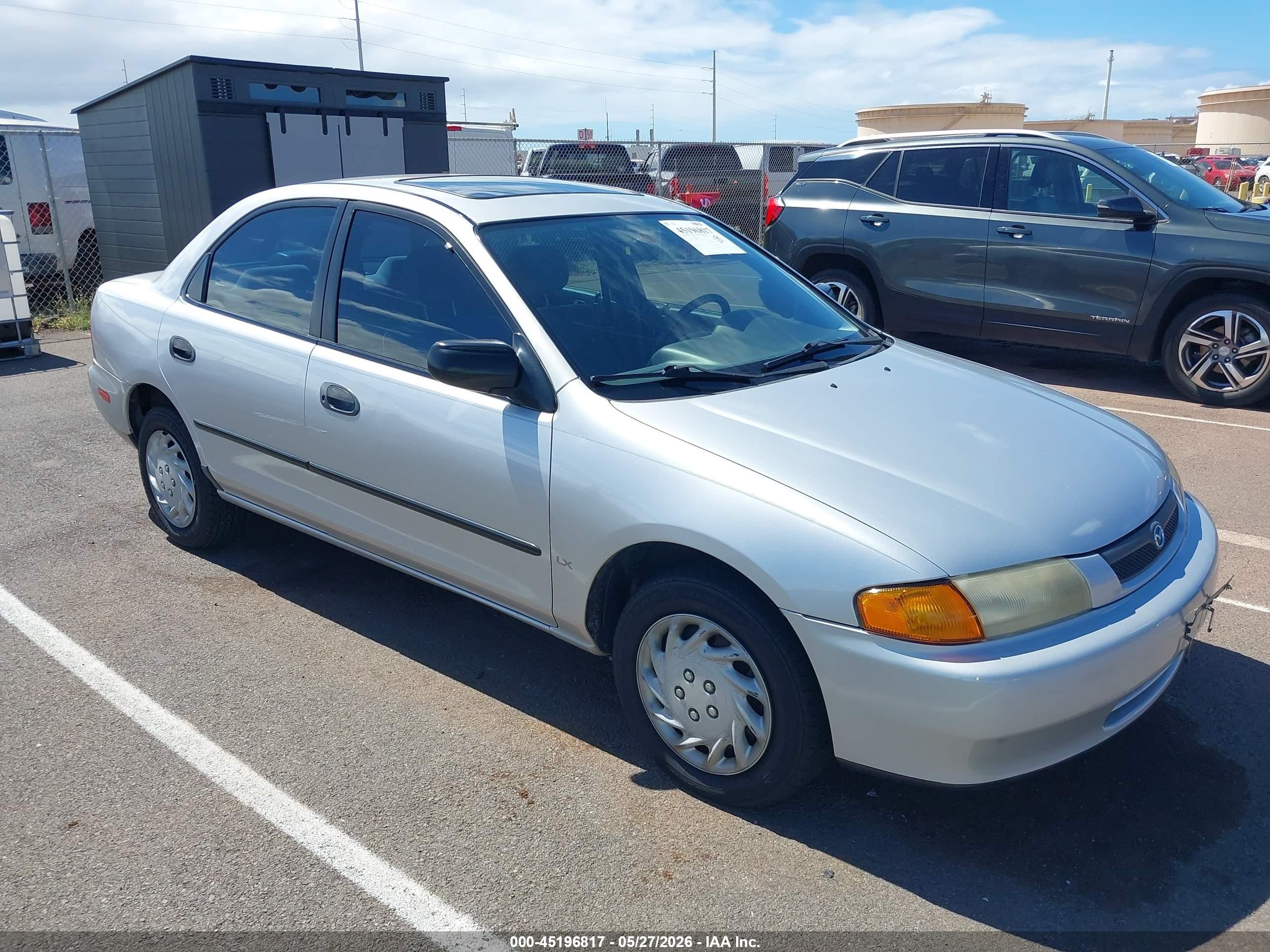 1998 Mazda Protege DX, VIN JM1BC1416W0208370 — Normal wear