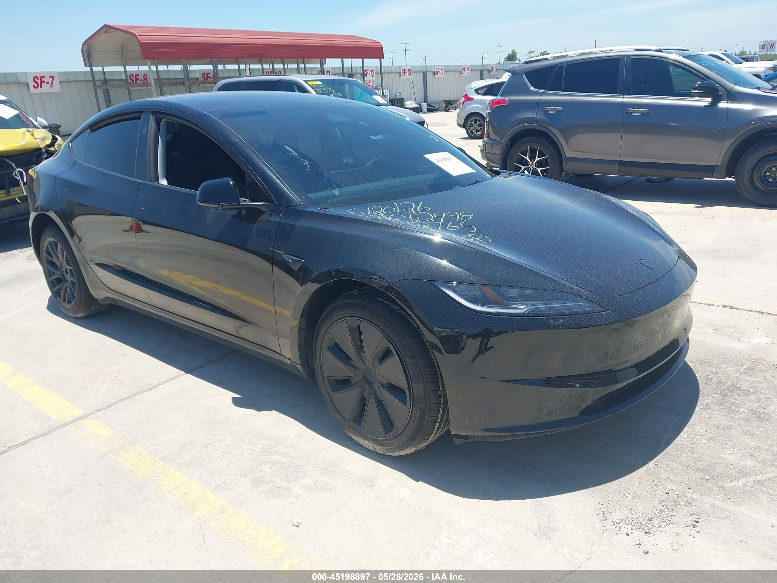 2026 Tesla Model 3 Premium, VIN 5YJ3E1EA2TF142765 — Side