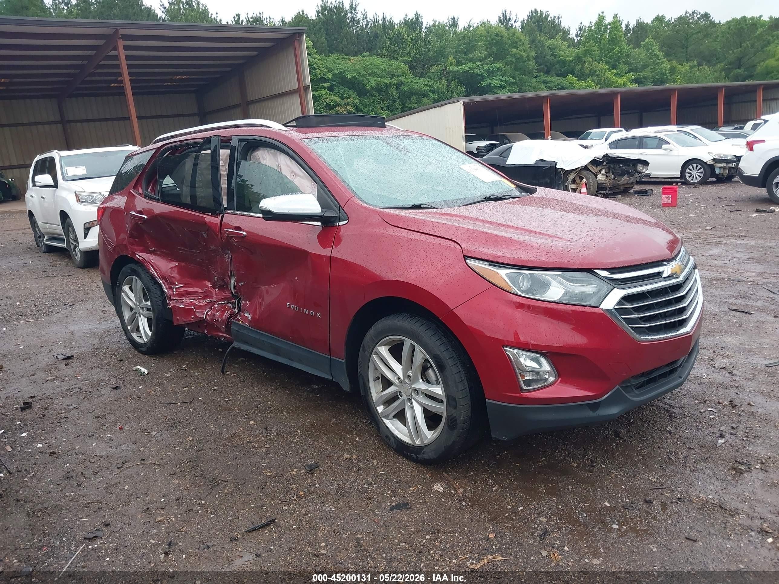 2018 Chevrolet Equinox Premier, VIN 3GNAXMEVXJL362747 — Side