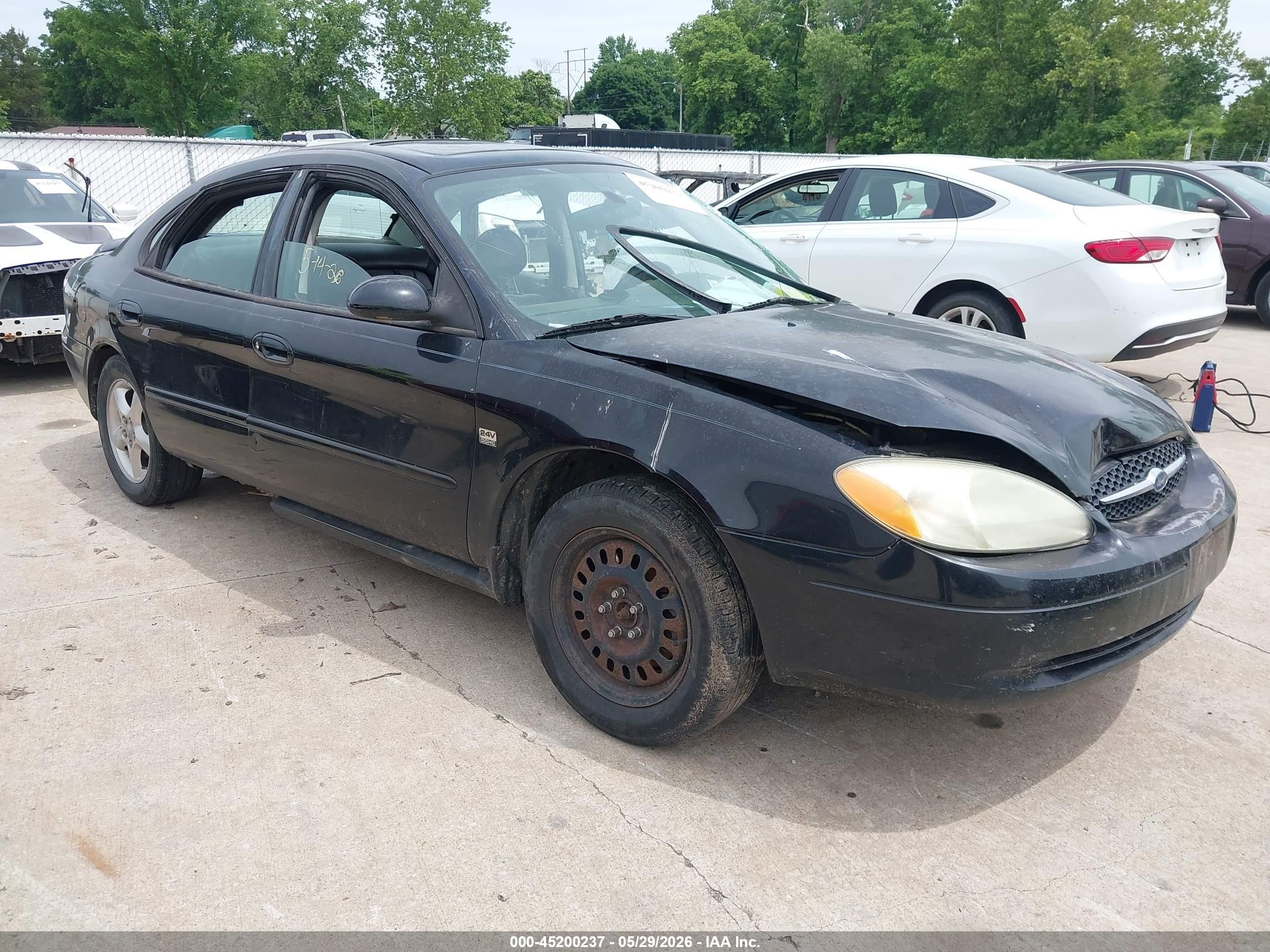 2003 Ford Taurus SES Standard, VIN 1FAFP55SX3A196272 — Side
