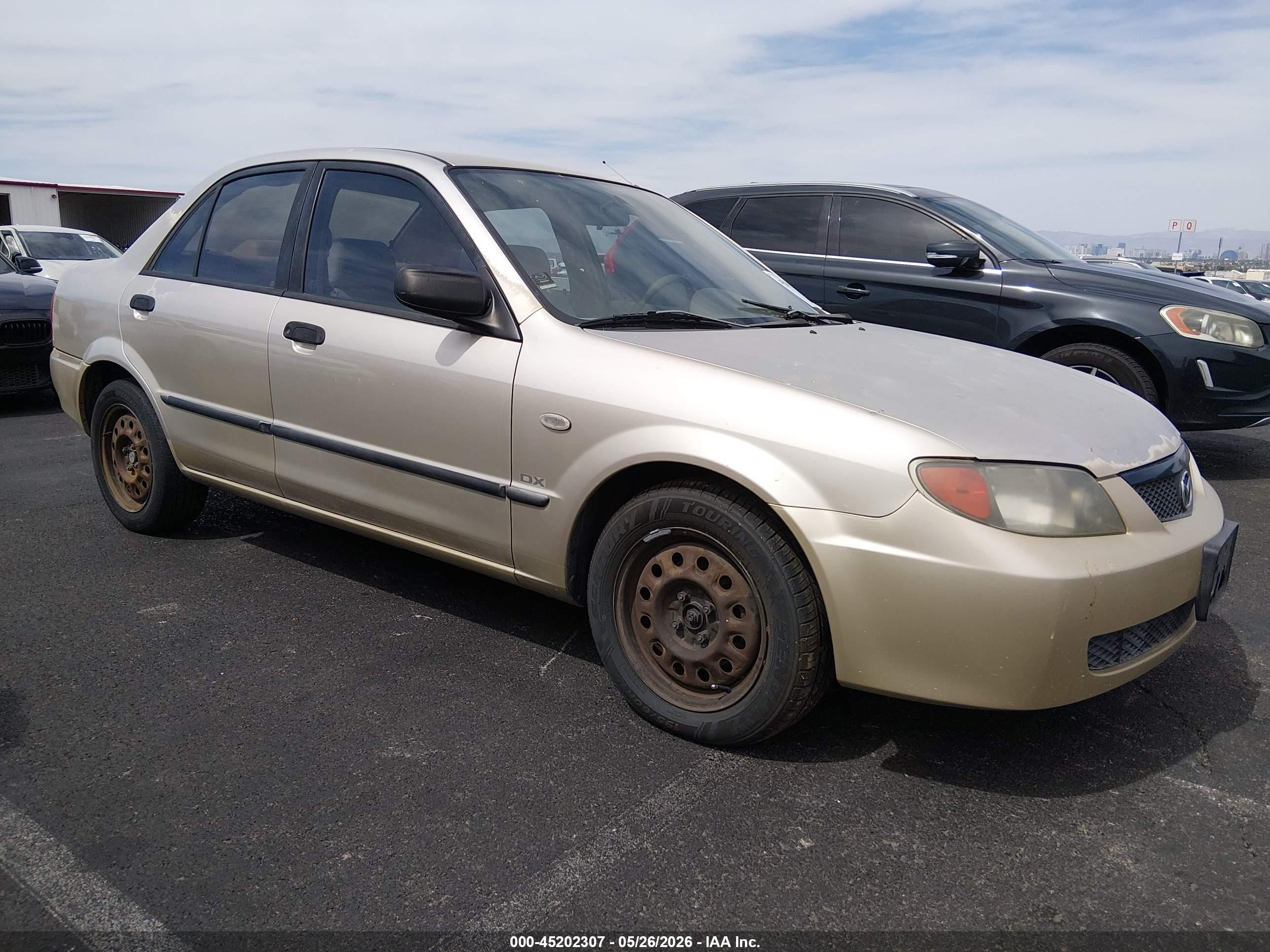 2002 Mazda Protege DX, VIN JM1BJ225221608769 — Normal wear