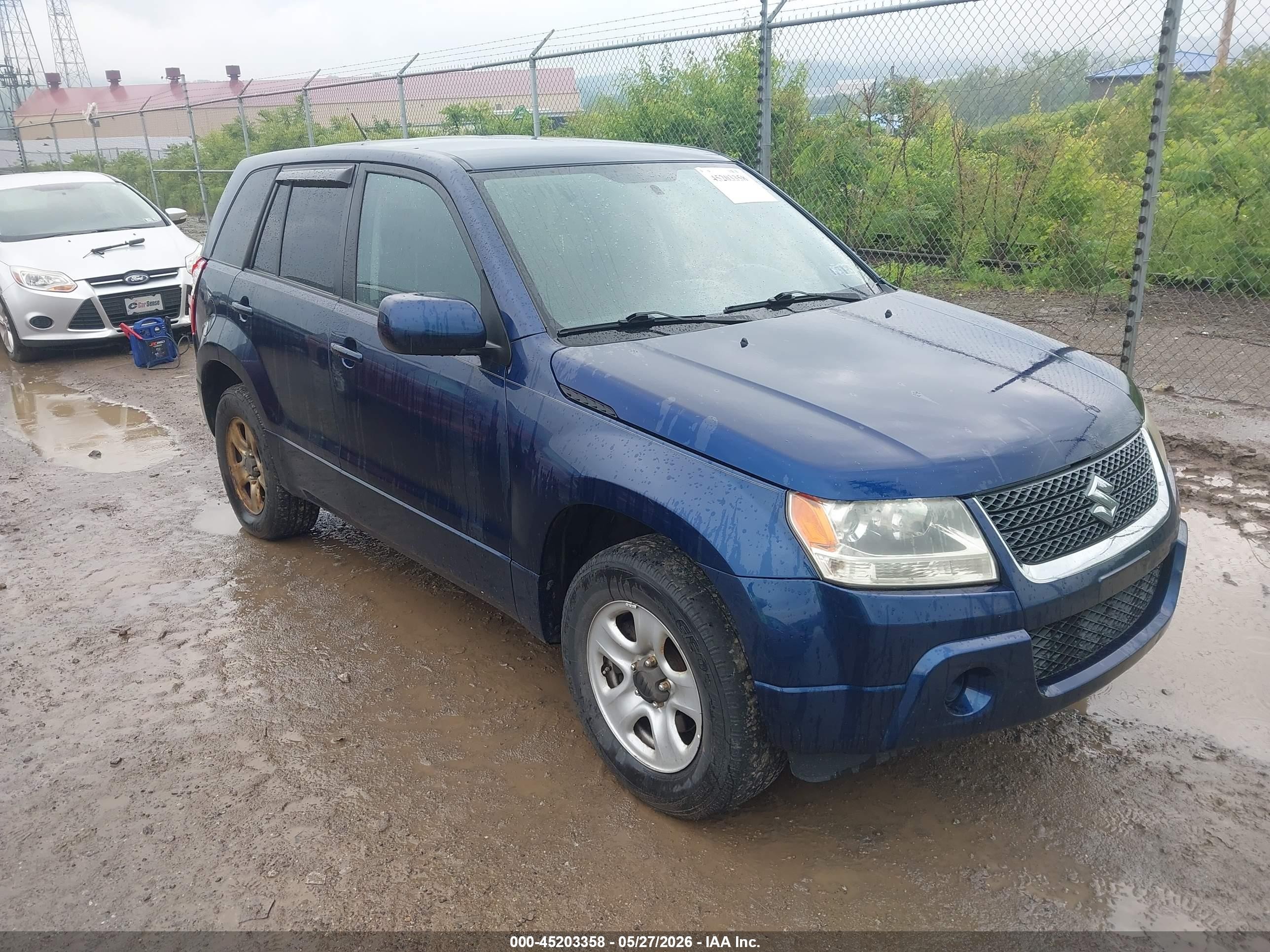 2012 Suzuki Grand Vitara Premium, VIN JS3TD0D23C4100430 — Side