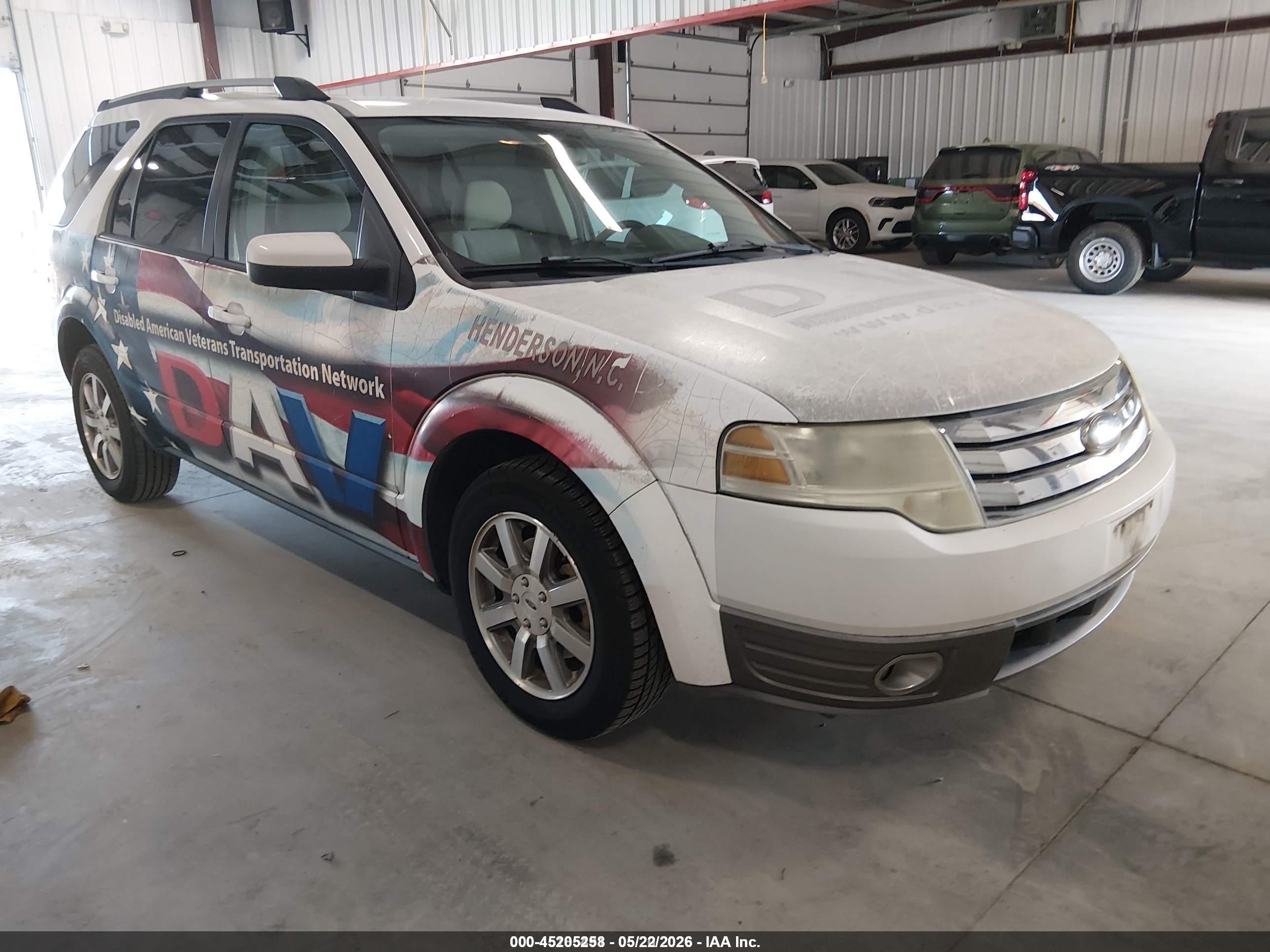 2008 Ford Taurus X SEL, VIN 1FMDK02W98GA39715 — Normal wear