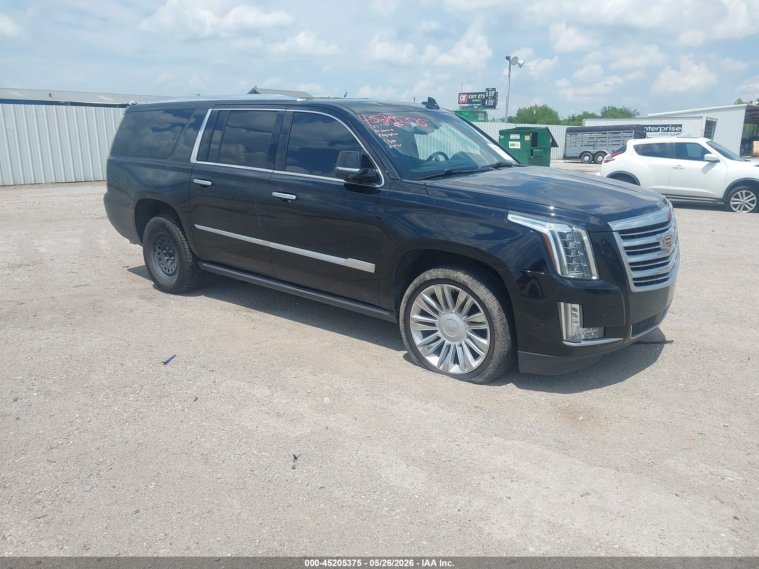 2018 Cadillac Escalade ESV Platinum, VIN 1GYS4KKJ0JR267354 — Hail