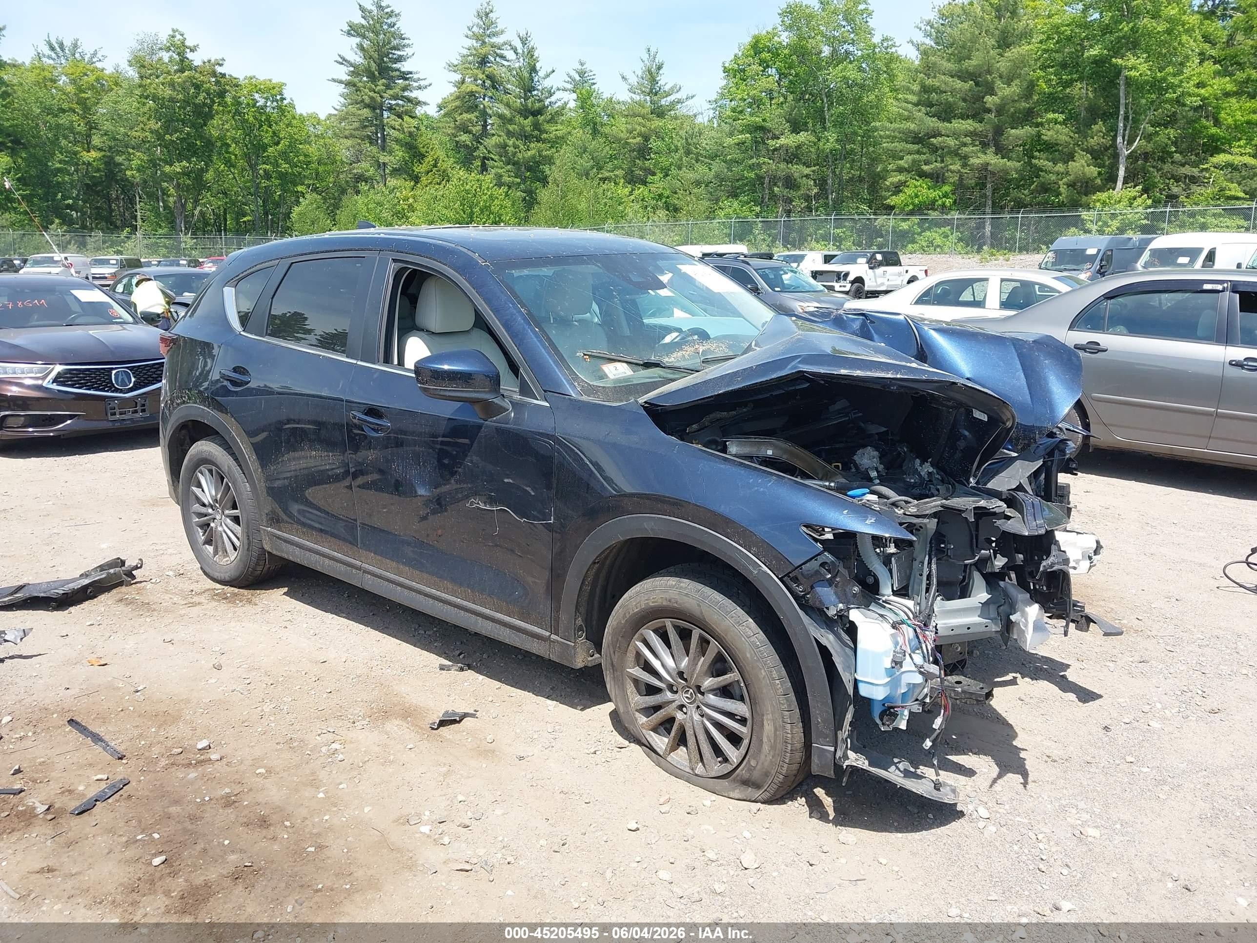 2021 Mazda CX-5 Touring, VIN JM3KFBCM1M1309694 — Front end