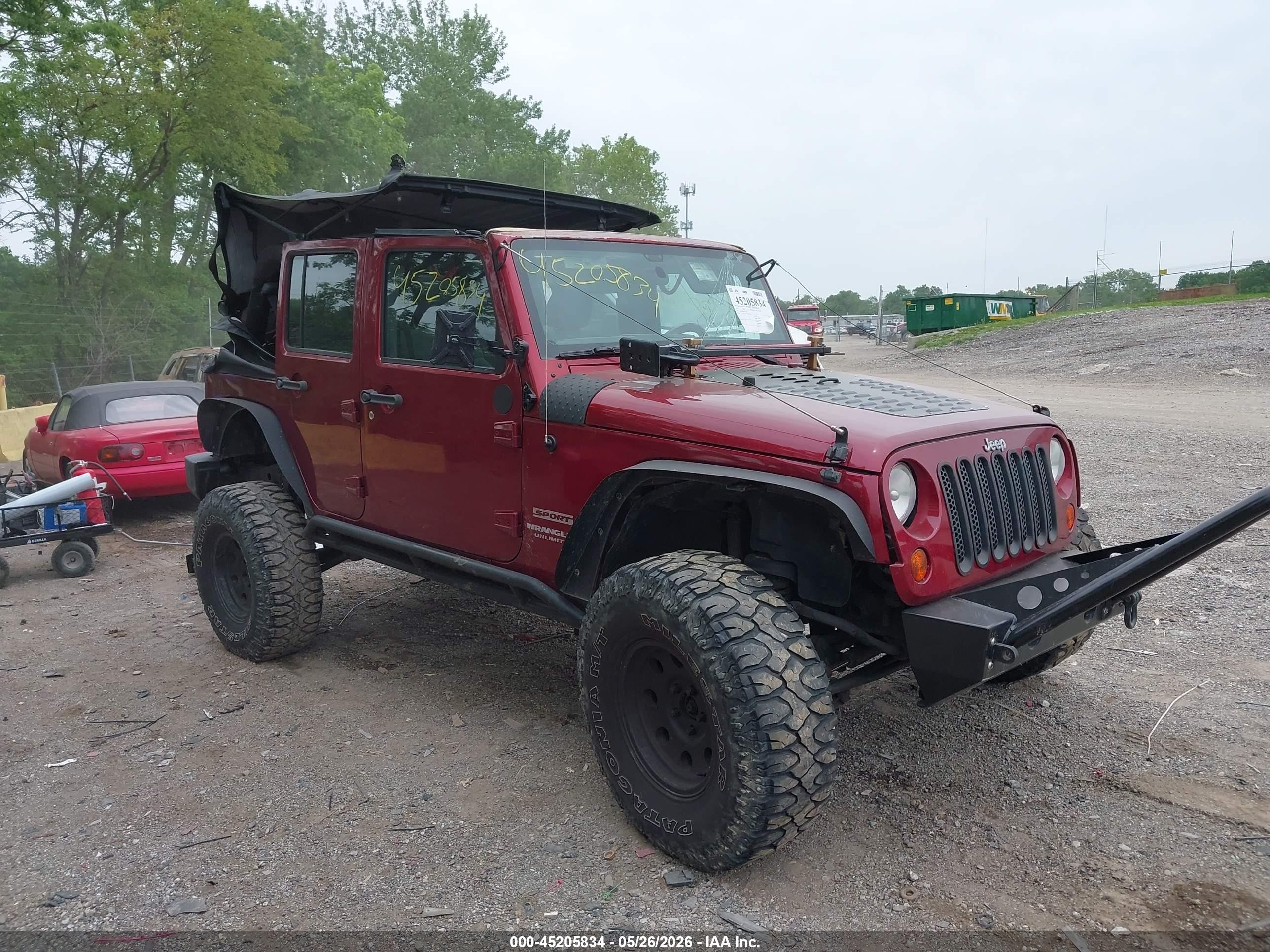 2012 Jeep Wrangler Unlimited Sport, VIN 1C4BJWDG4CL227856 — Rollover