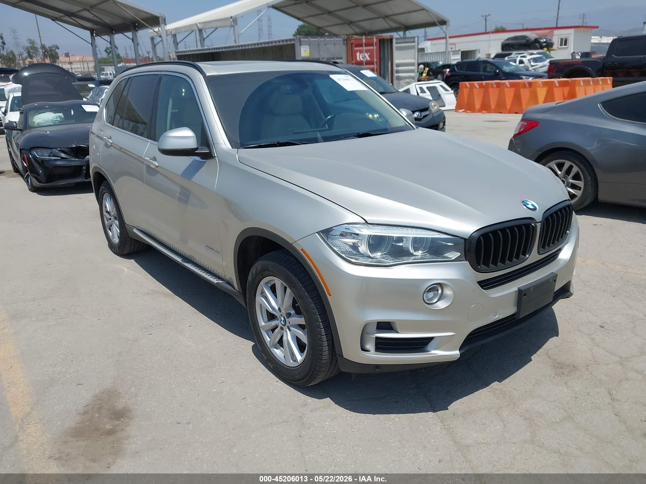 2015 BMW X5 sDrive35i, VIN 5UXKR2C52F0H38801 — Side