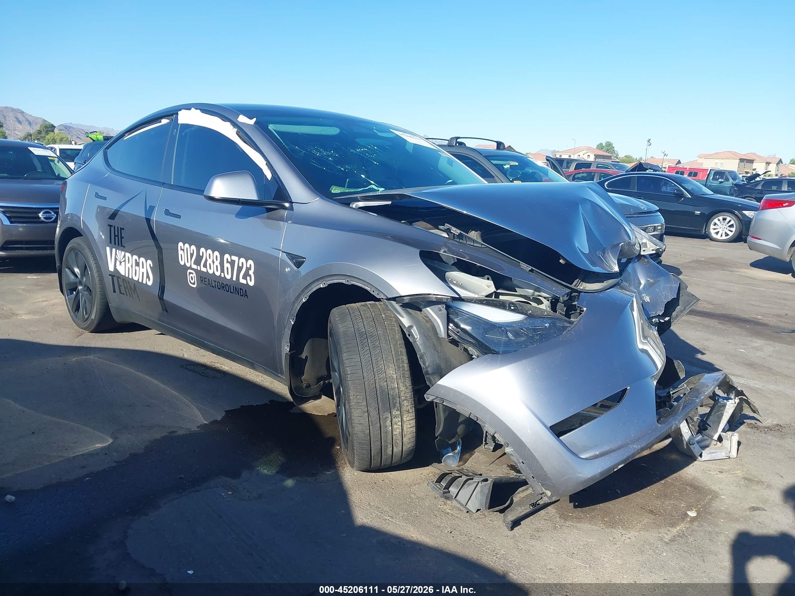 2025 Tesla Model Y Long Range, VIN 7SAYGDED1SF222040 — Front end