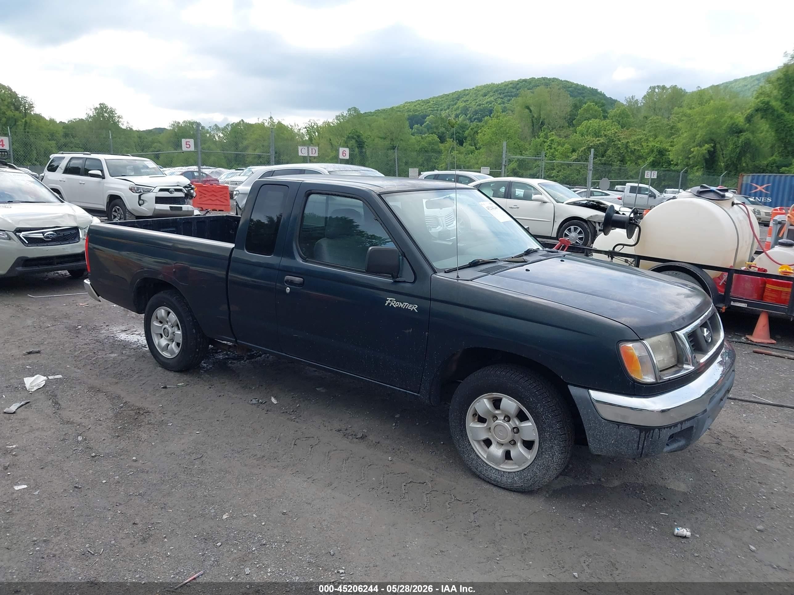1999 Nissan Frontier XE, VIN 1N6DD26S0XC335713 — Normal wear
