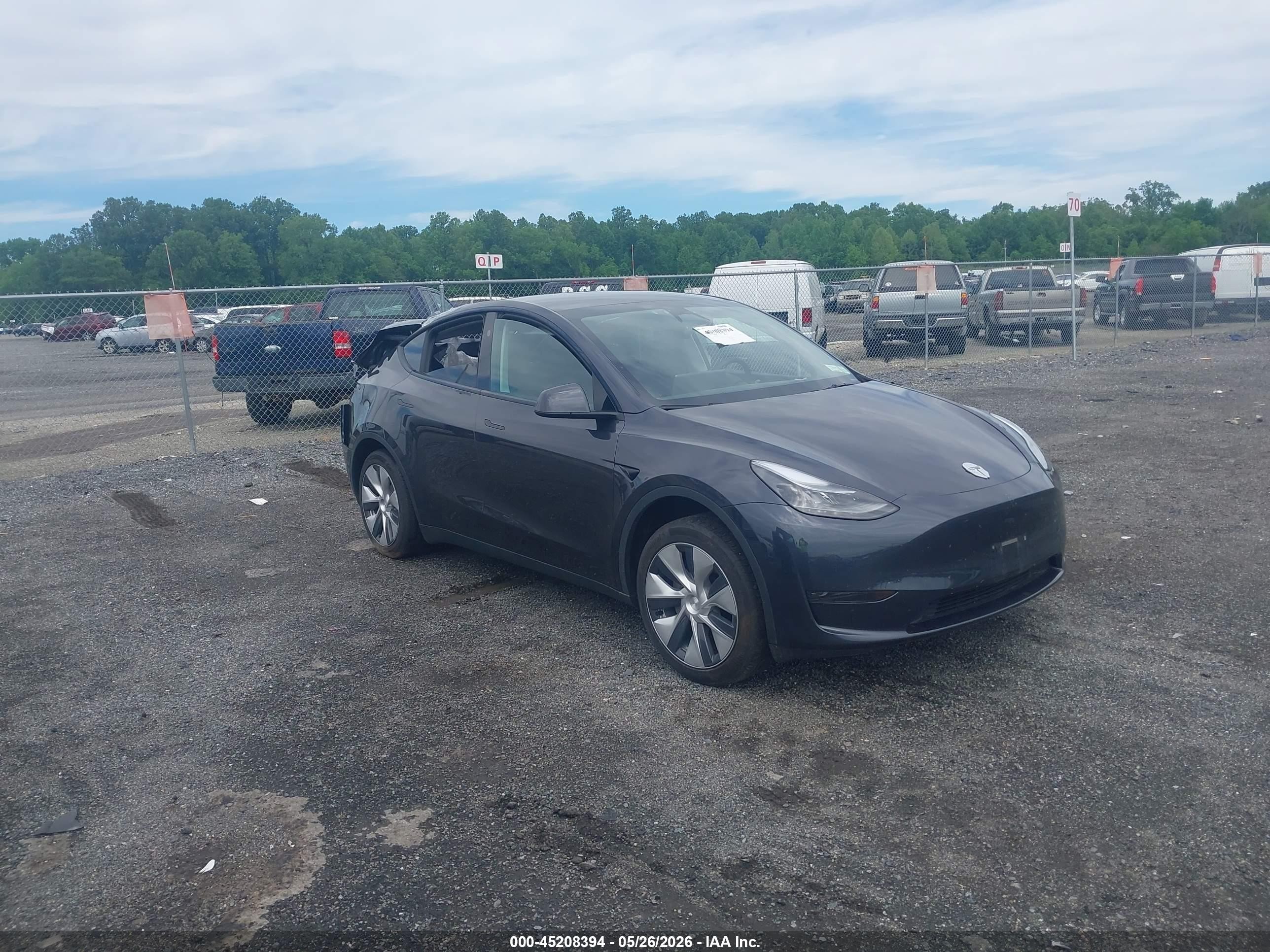 2024 Tesla Model Y, VIN 7SAYGDED9RF017950 — Rear end
