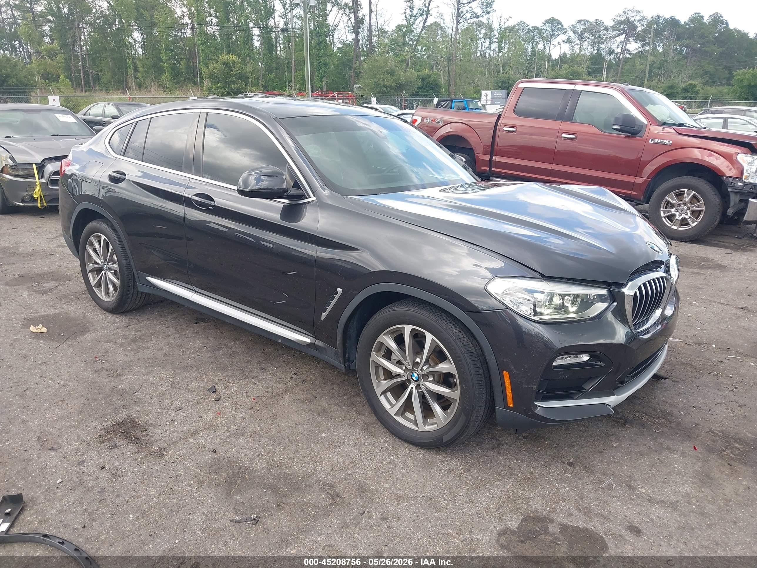 2019 BMW X4 xDrive30i, VIN 5UXUJ3C59KLG54344 — Front end