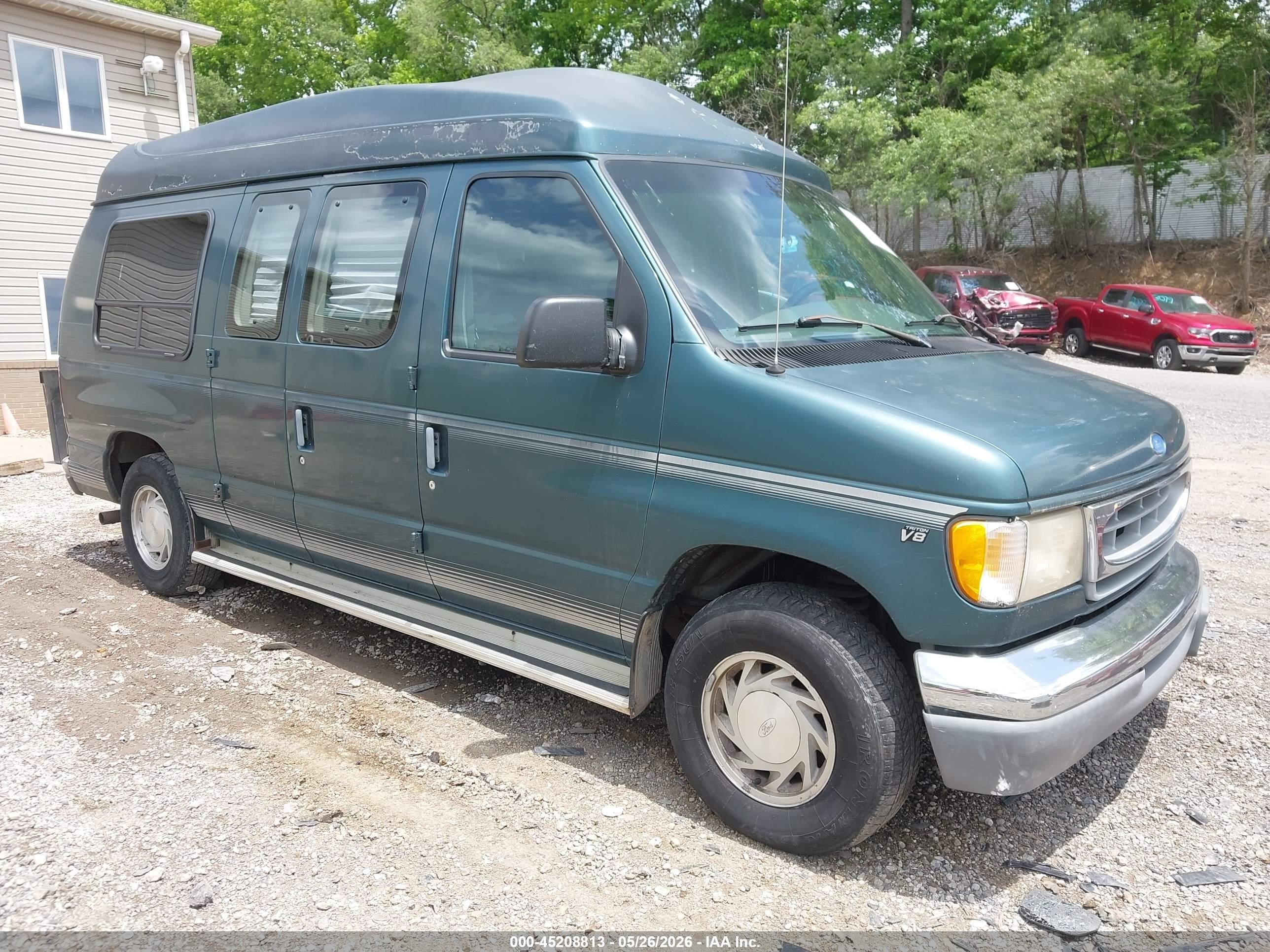 1997 Ford Econoline Commercial, VIN 1FDEE14L5VHB88004 — Side