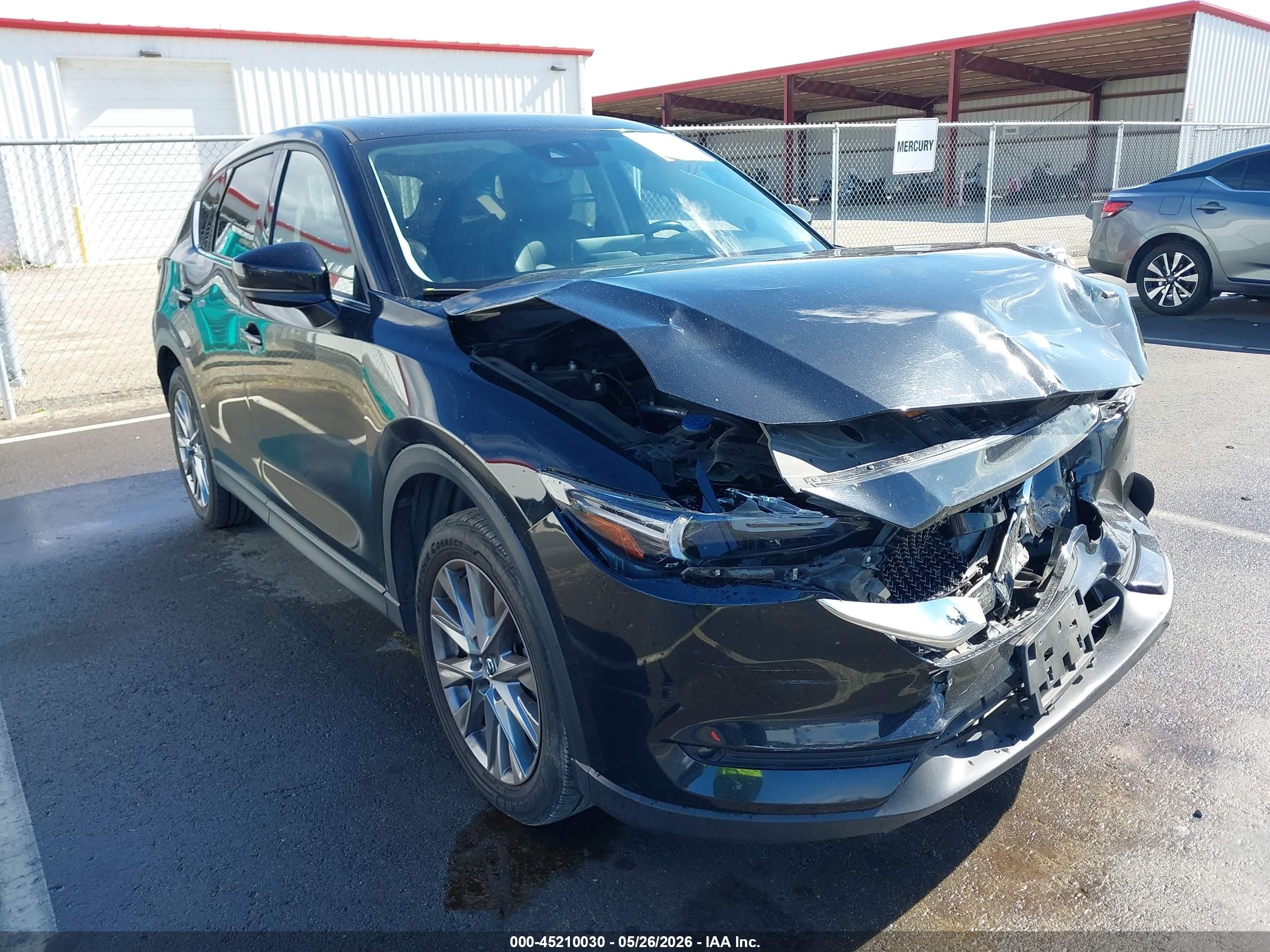 2021 Mazda CX-5 Grand Touring, VIN JM3KFADM7M0360924 — Front end