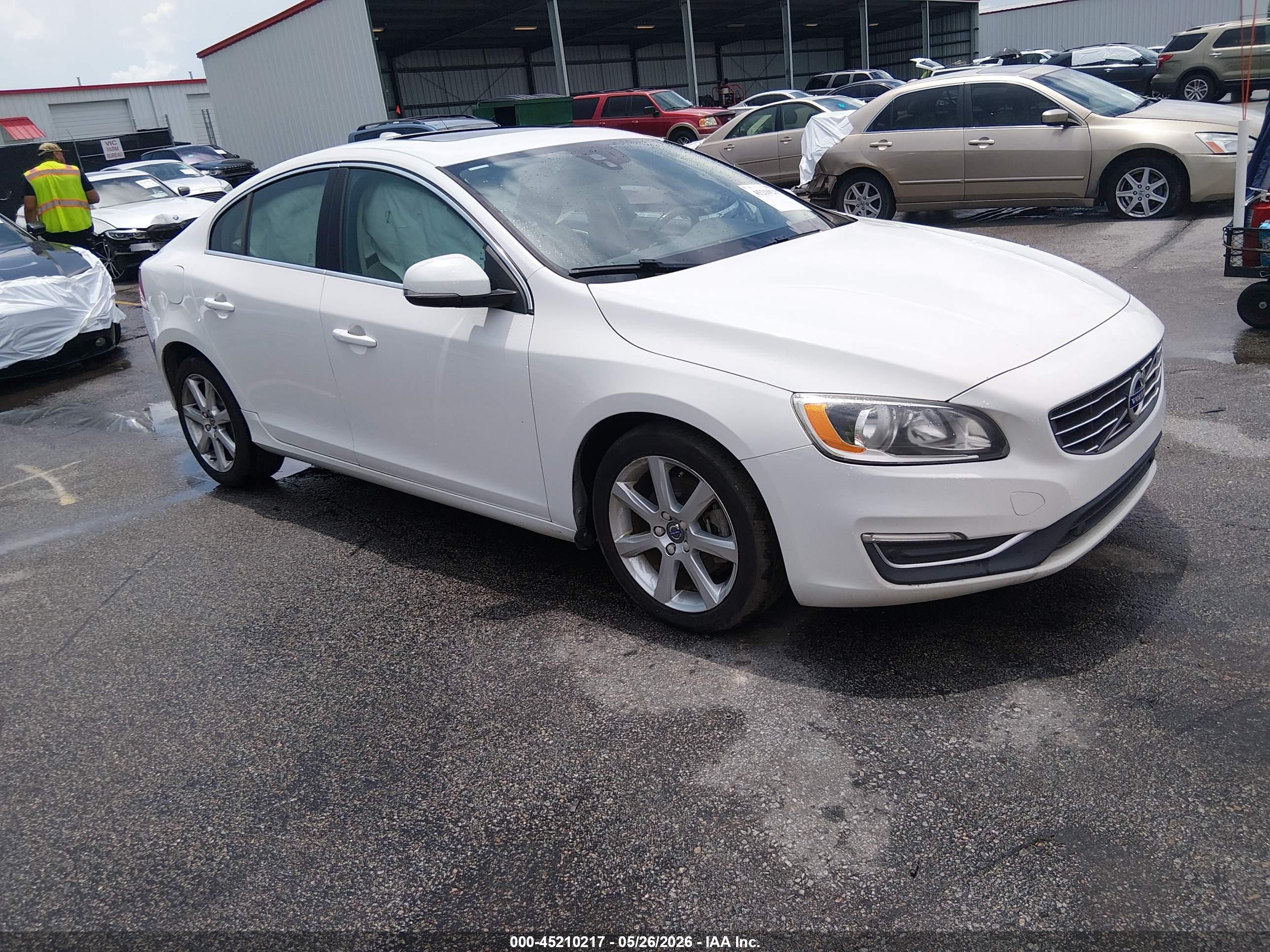 2016 Volvo S60 T5 Drive-E Premier, VIN YV126MFK5G2408865 — Side