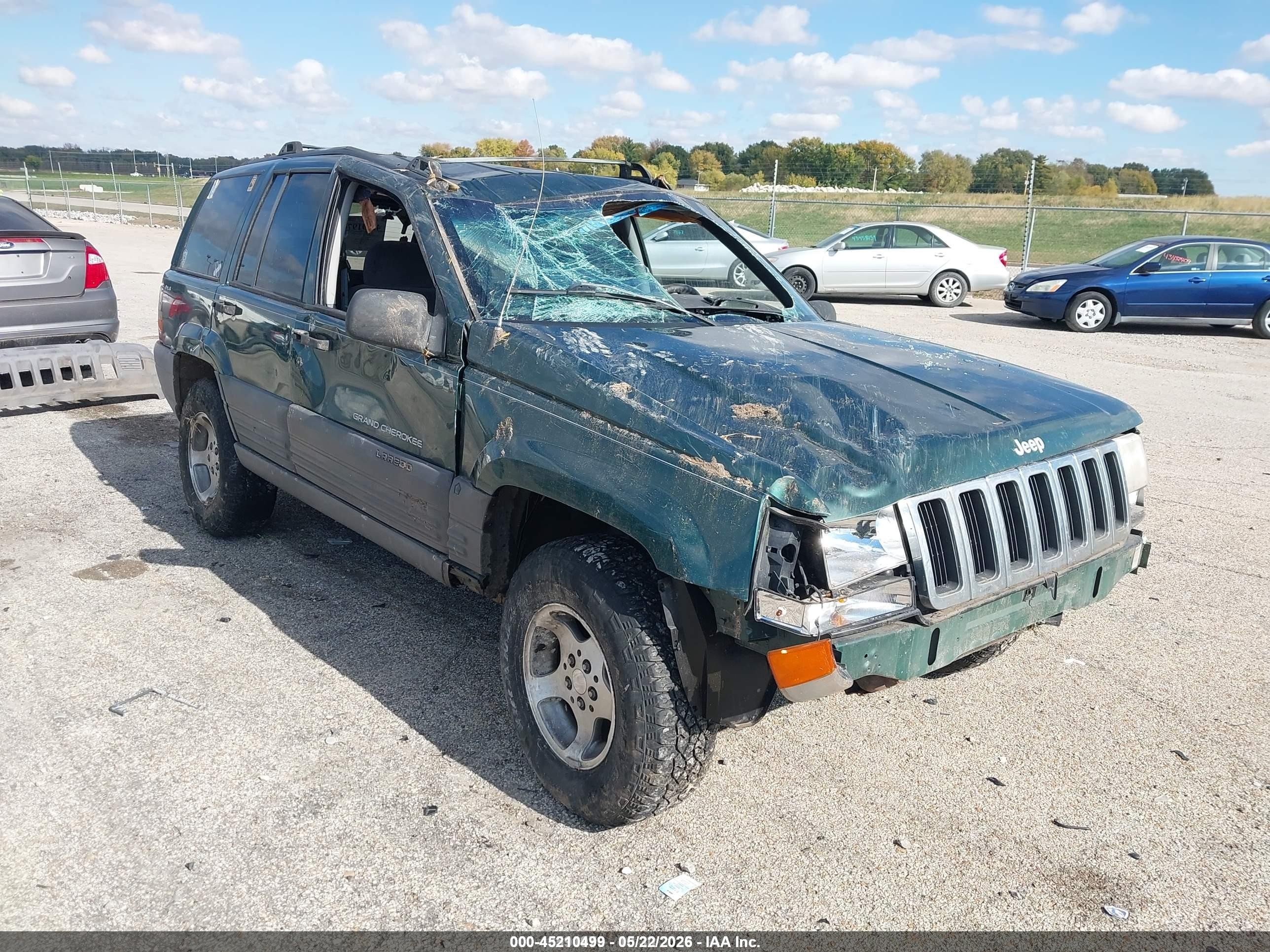 1996 Jeep Grand Cherokee Laredo, VIN 1J4GZ58SXTC308250 — Rollover