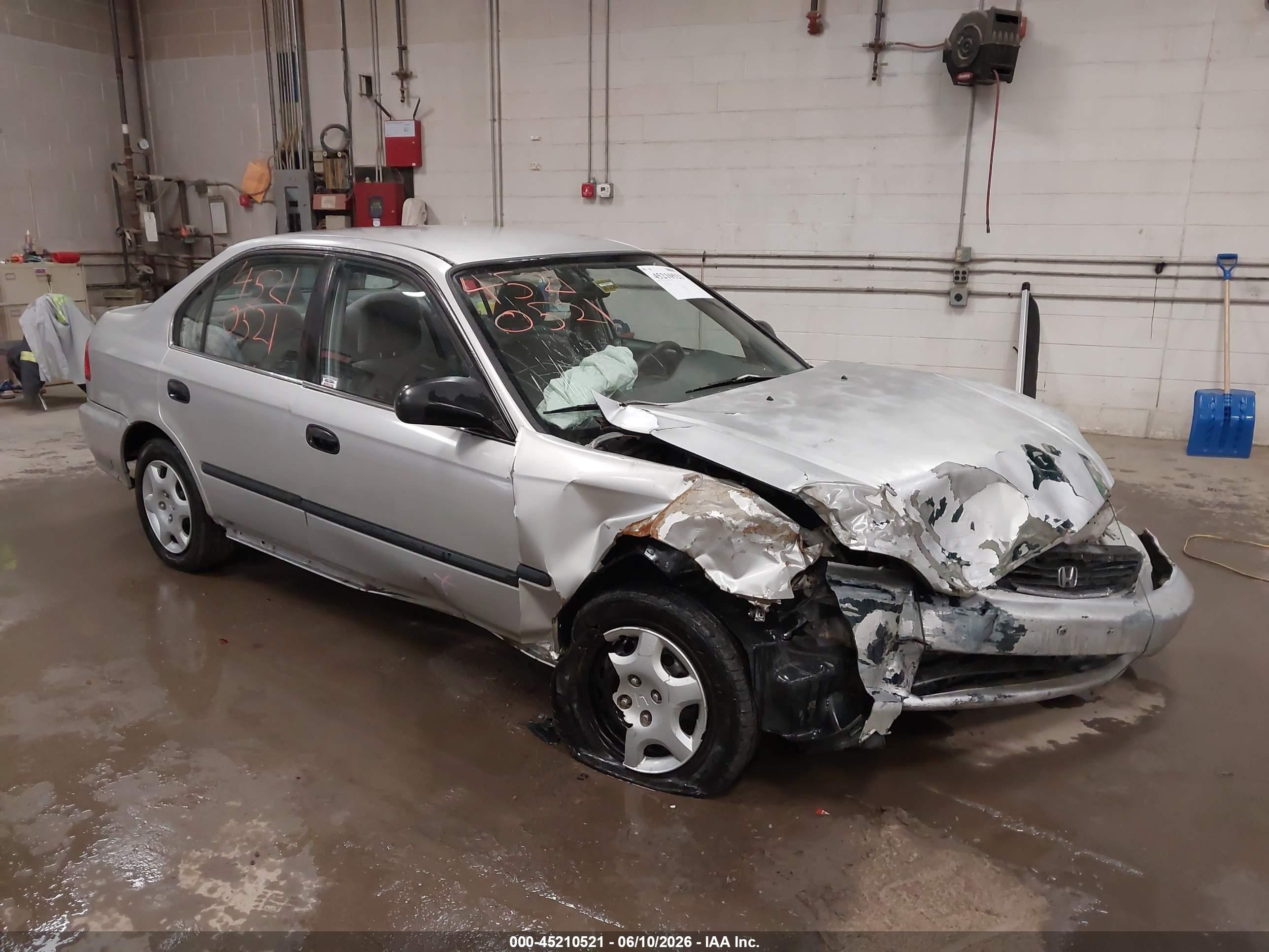 1999 Honda Civic LX, VIN 2HGEJ6576XH560009 — Front end