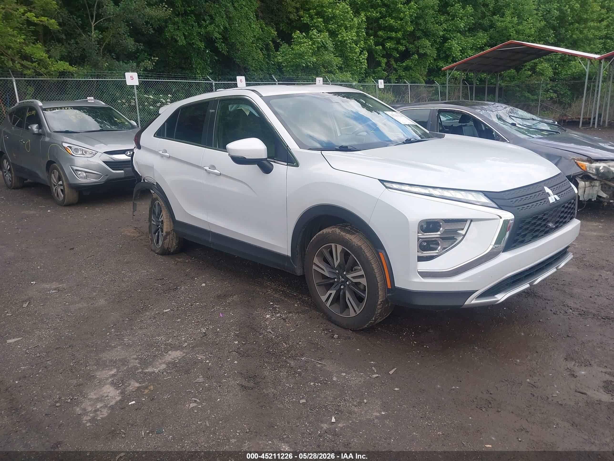 2024 Mitsubishi Eclipse Cross SE, VIN JA4ATWAA0RZ068226 — Rear end