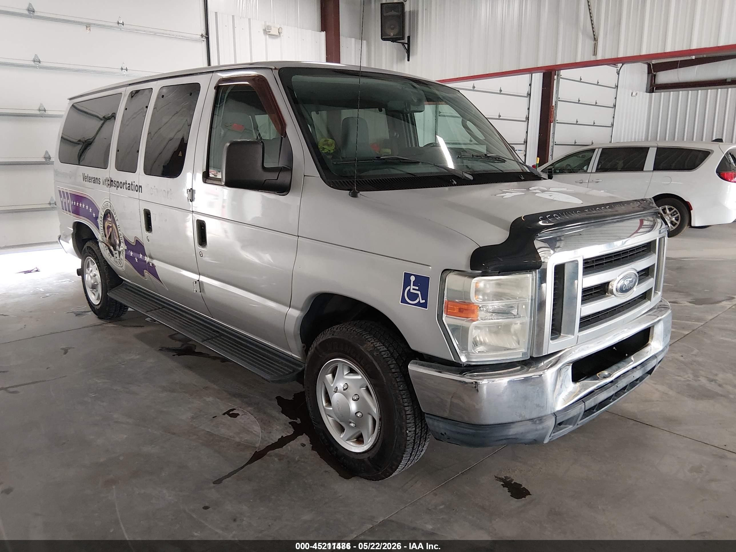 2012 Ford Econoline Passenger XLT, VIN 1FBNE3BL6CDA61158 — Normal wear