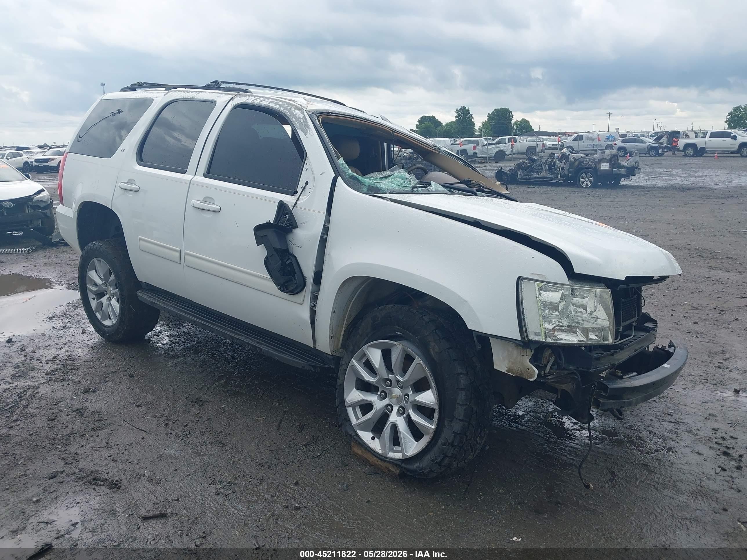 2010 Chevrolet Tahoe LT, VIN 1GNUKBE09AR211637 — Rollover