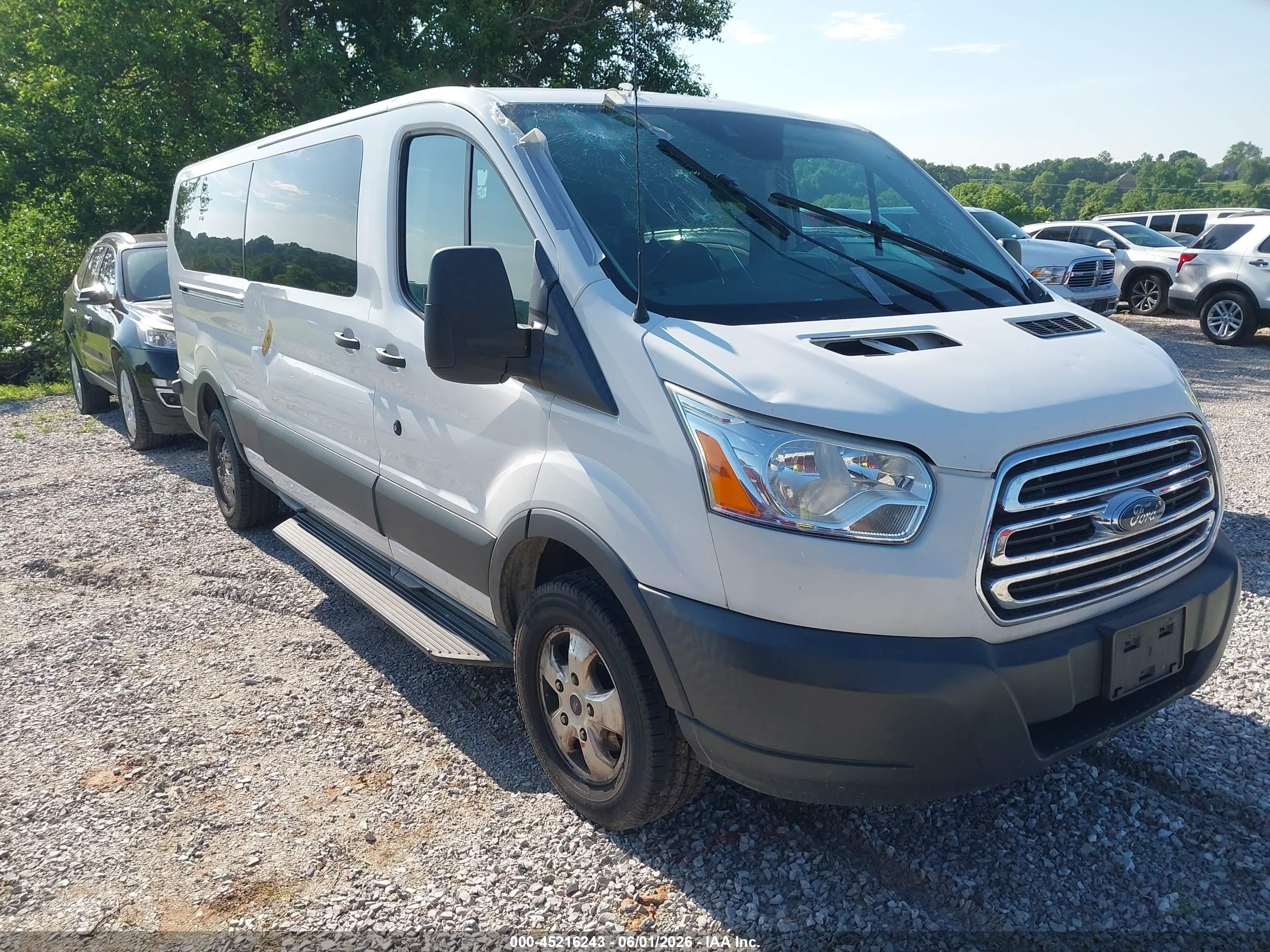 2018 Ford Transit Passenger XLT, VIN 1FBZX2YM0JKB09431 — Hail