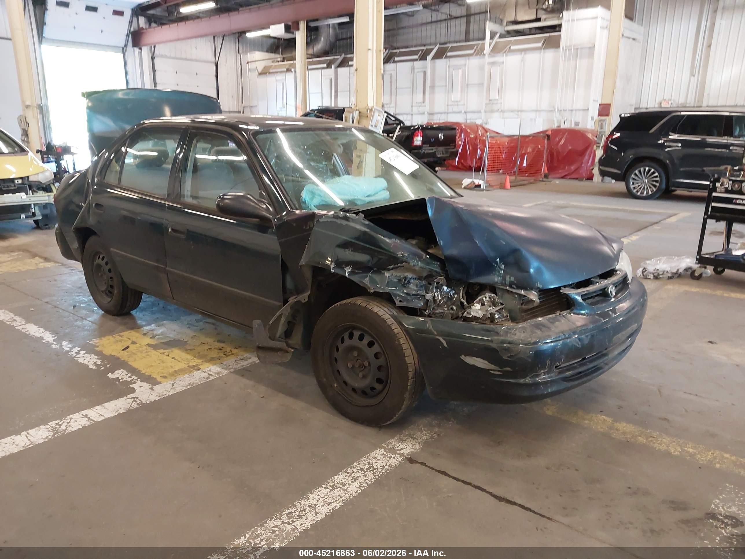 1999 Toyota Corolla LE, VIN 1NXBR12E7XZ156712 — All over