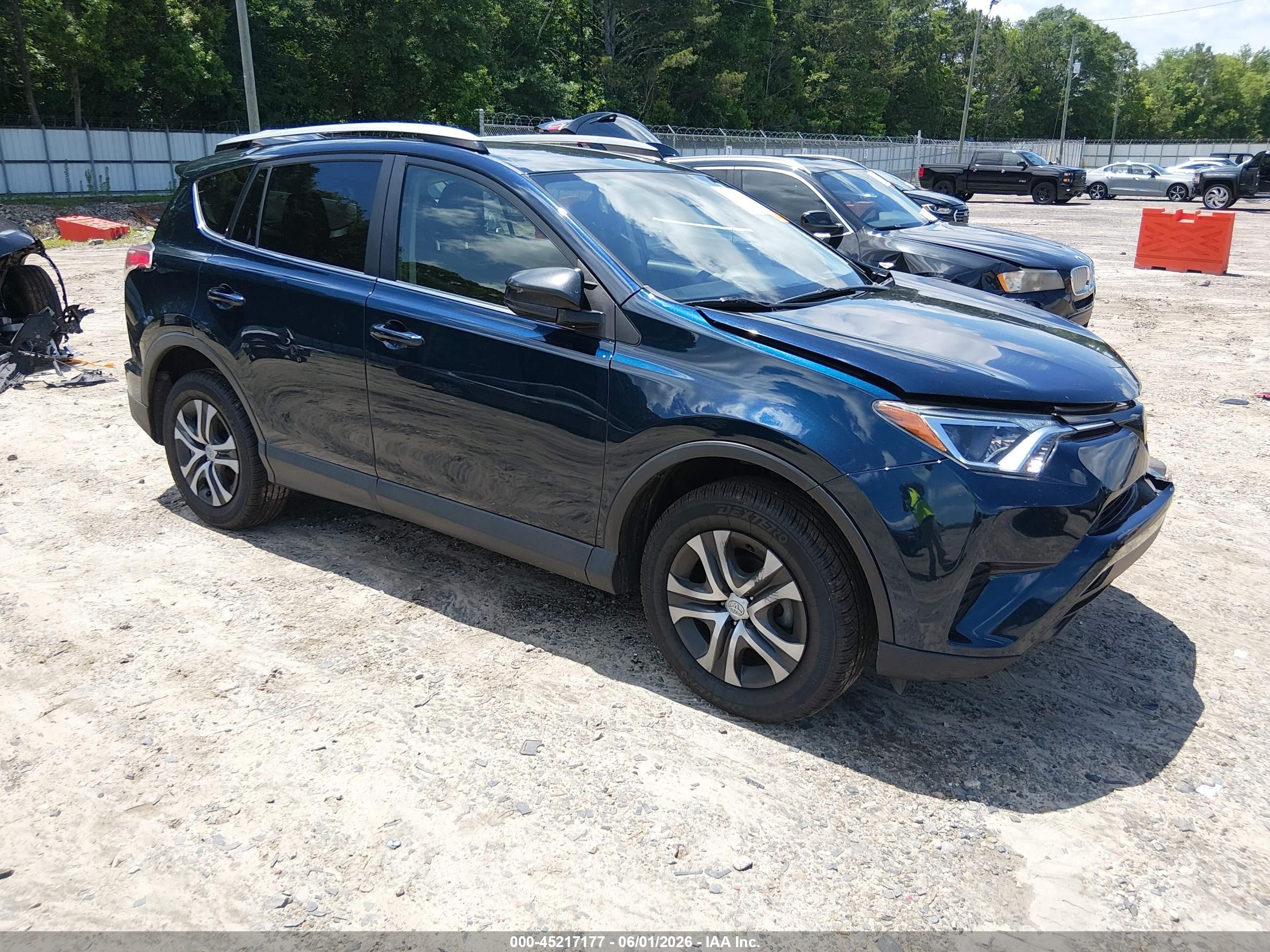 2018 Toyota RAV4 LE, VIN JTMZFREV3JJ731502 — Front end