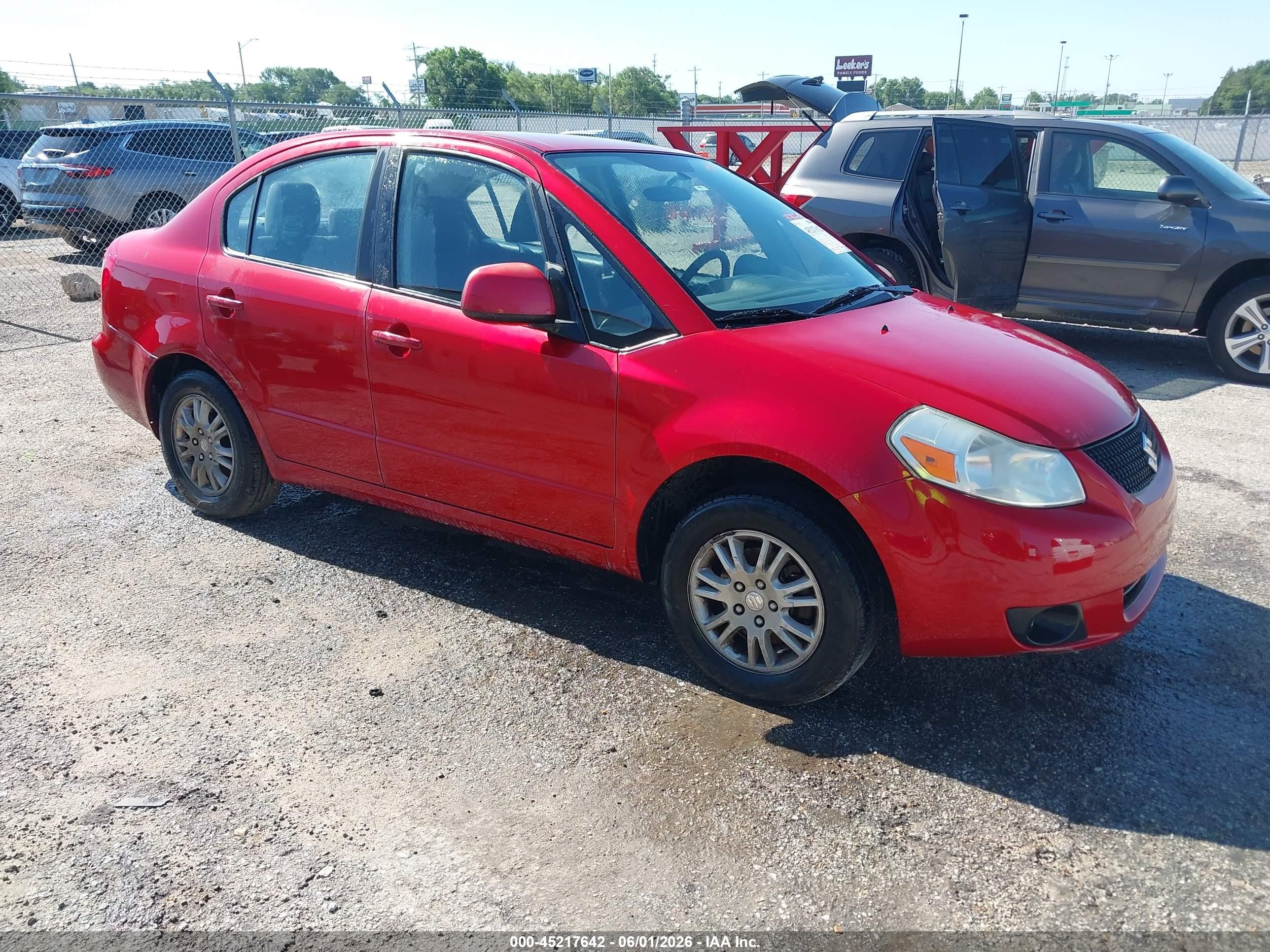 2012 Suzuki SX4 LE, VIN JS2YC5A30C6304310 — Rear end