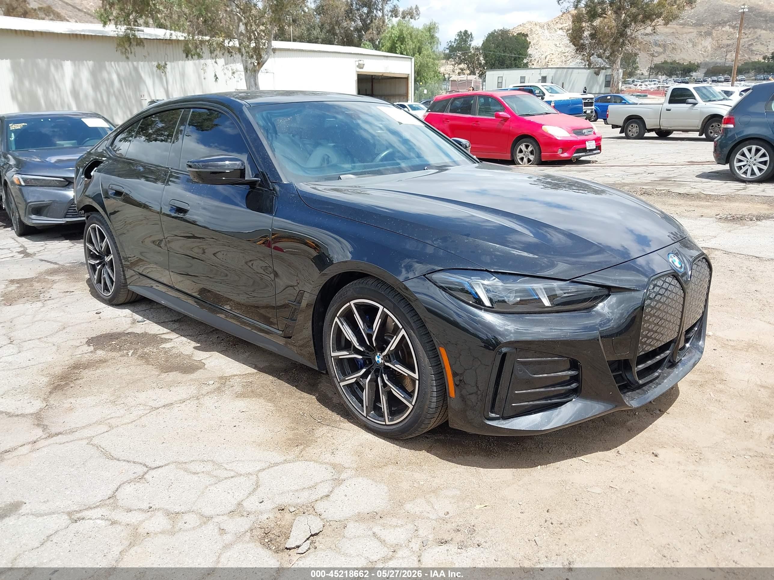2025 BMW i4 xDrive40, VIN WBY43HD06SFU60439 — Rear end