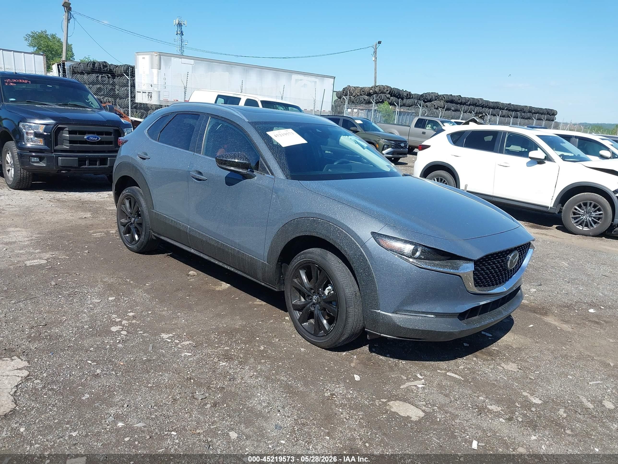 2023 Mazda CX-30 S Carbon Edition, VIN 3MVDMBCM7PM535574 — Side