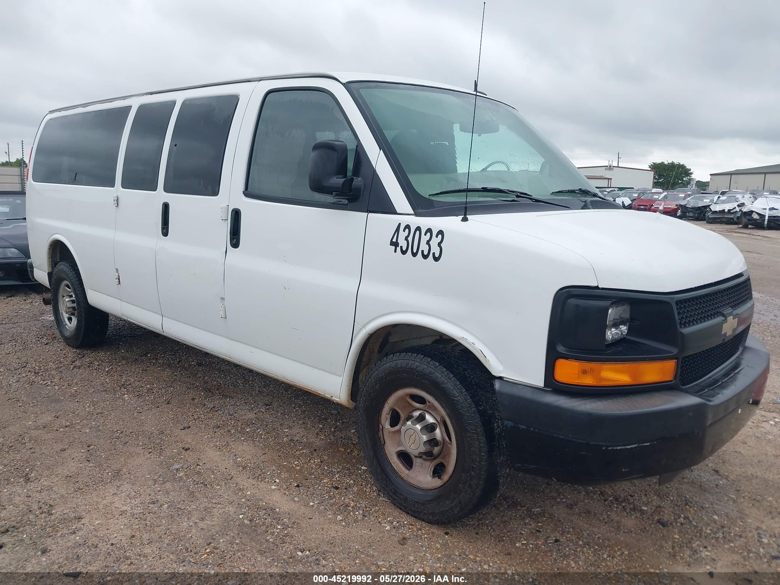 2012 Chevrolet Express Passenger 1LS, VIN 1GAZGZFA6C1143033 — Rear end
