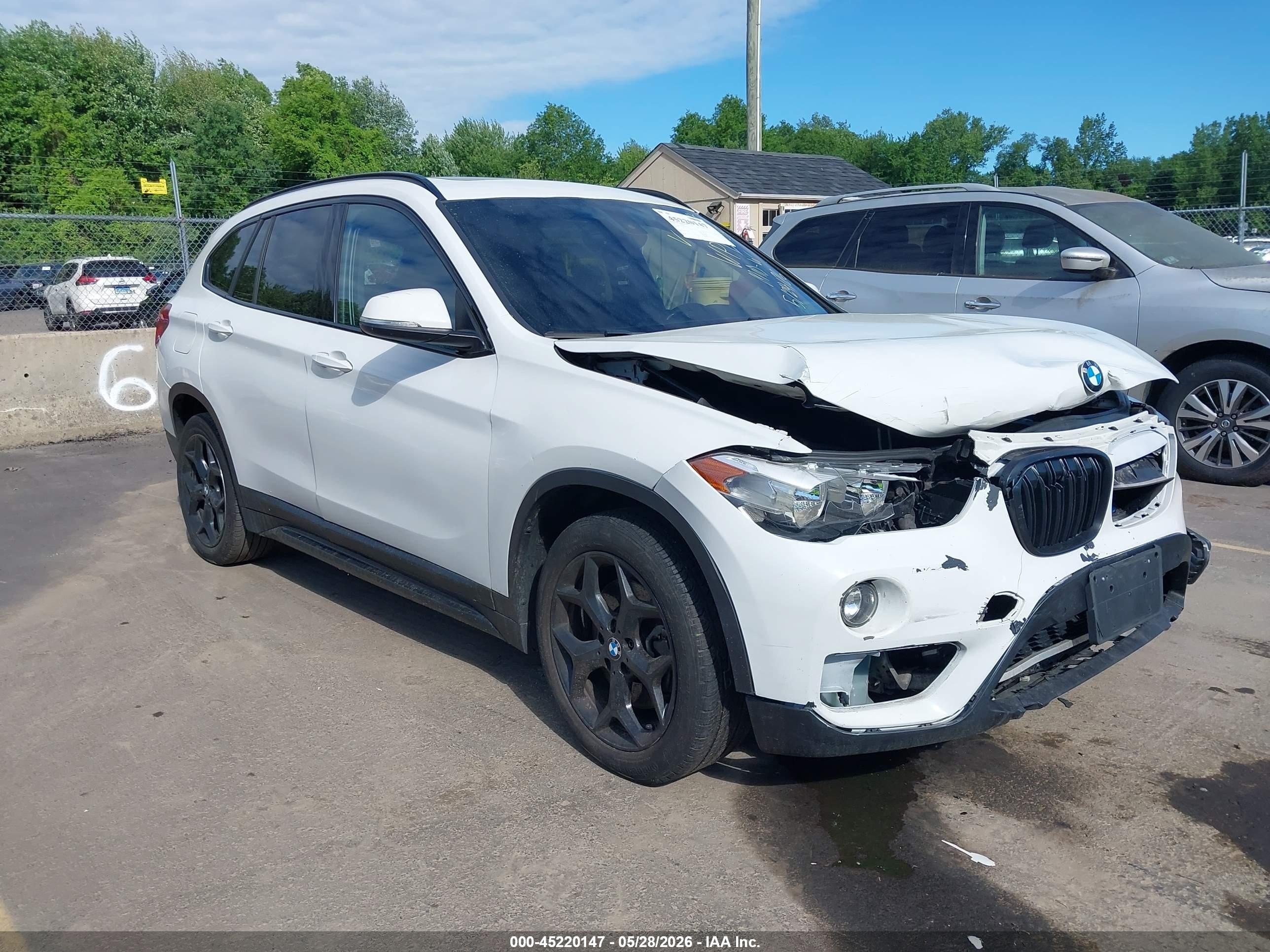 2018 BMW X1 xDrive28i, VIN WBXHT3C33J5K25134 — Front end