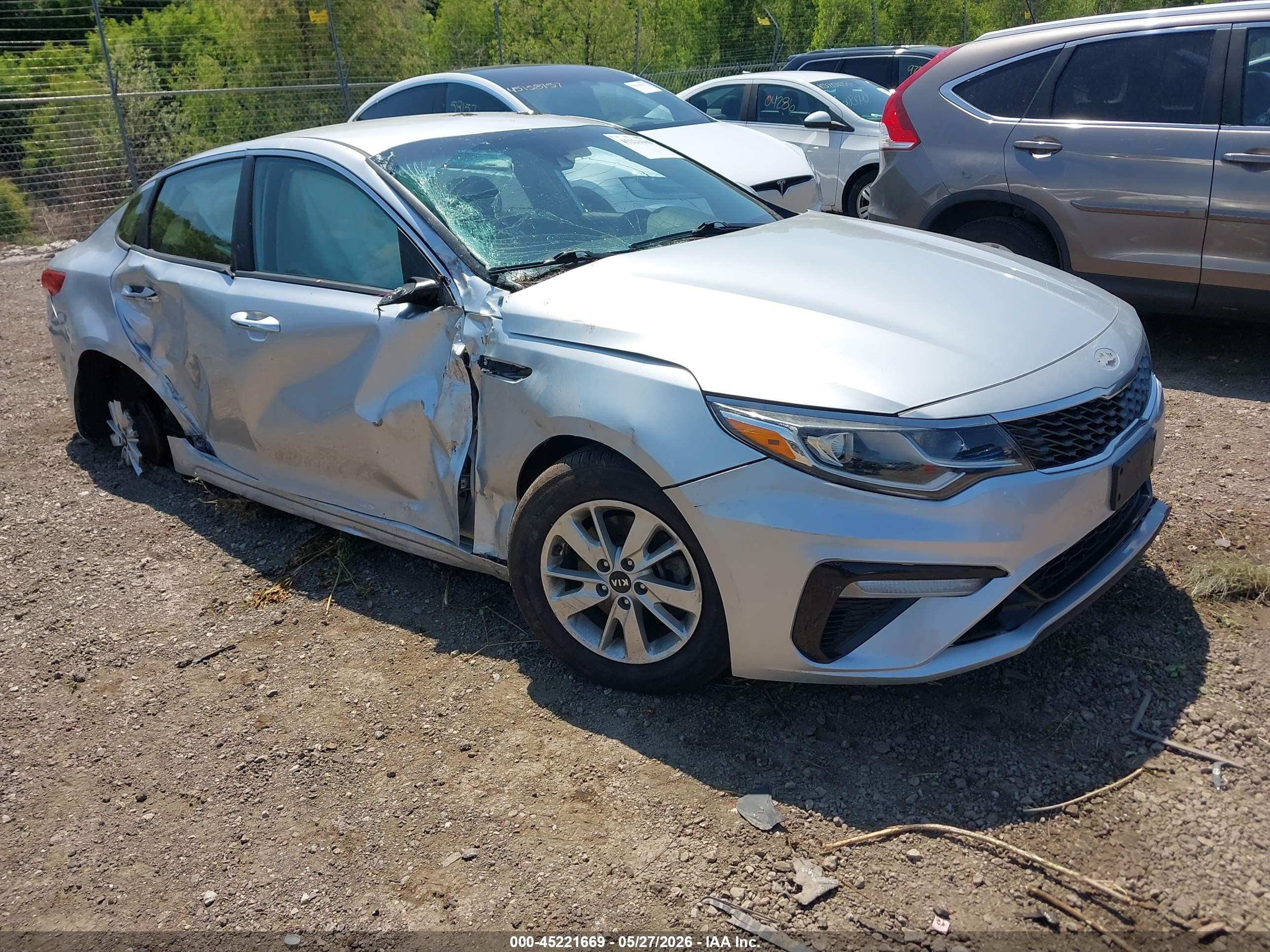 2019 Kia Optima LX, VIN 5XXGT4L31KG279639 — Side