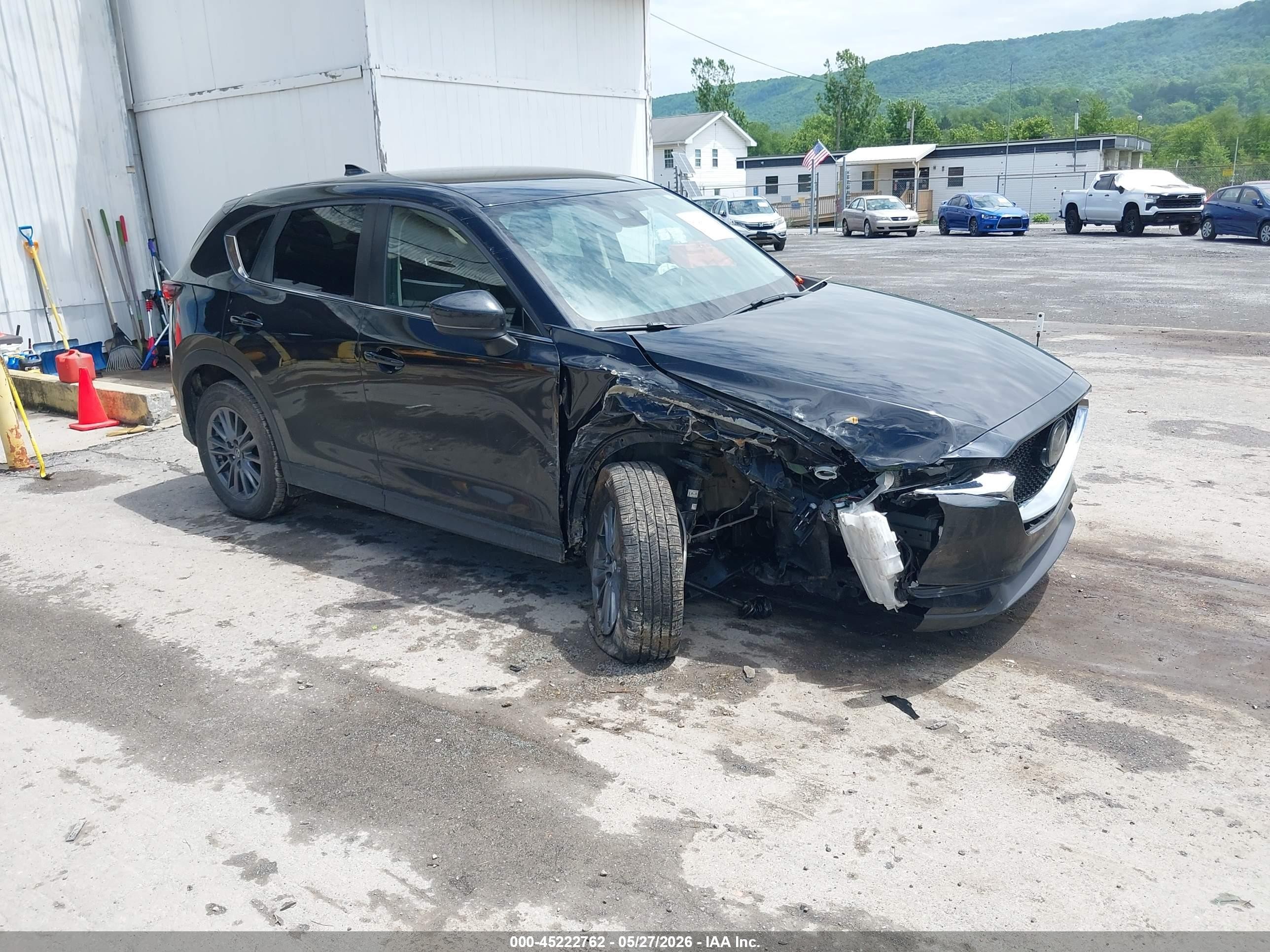 2021 Mazda CX-5 Carbon Edition, VIN JM3KFBCM8M0338891 — Side