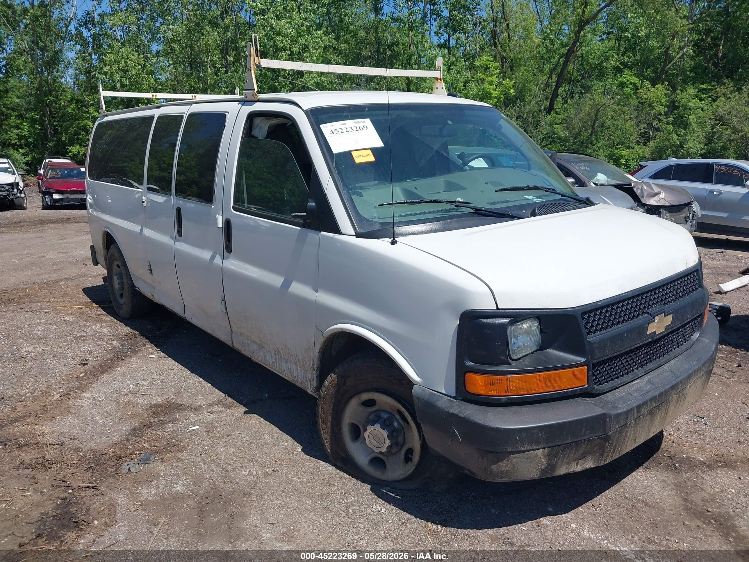 2012 Chevrolet Express Passenger 1LS, VIN 1GAZGZFG1C1169656 — Front end