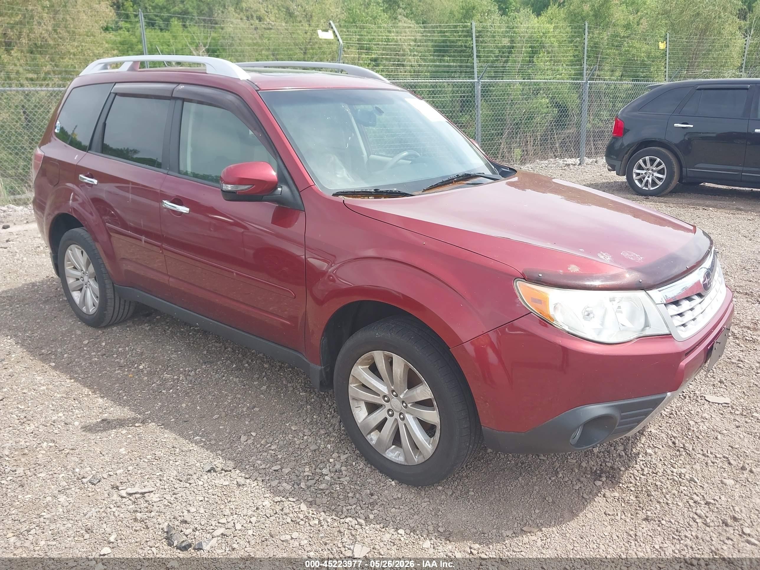 2012 Subaru Forester X Touring, VIN JF2SHBGC7CH409715 — Auction photo