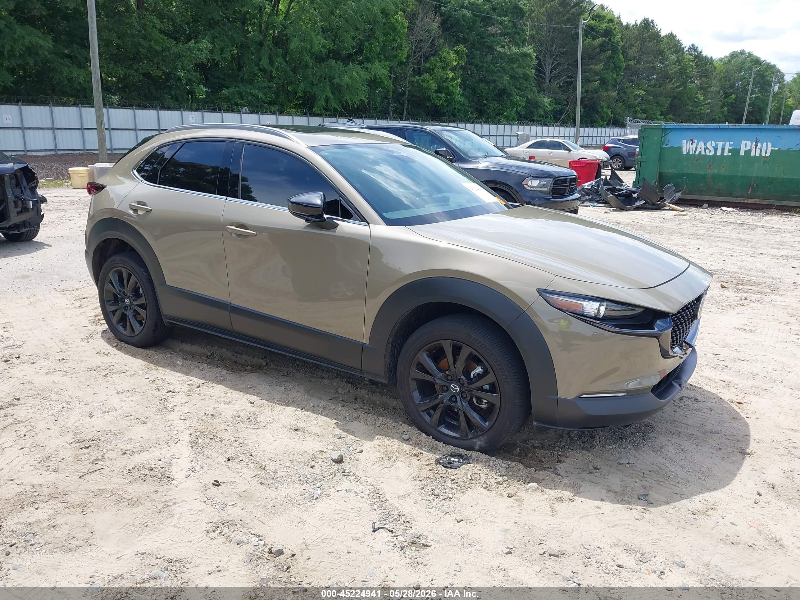 2024 Mazda CX-30 Carbon Edition, VIN 3MVDMBXY9RM613224 — Side