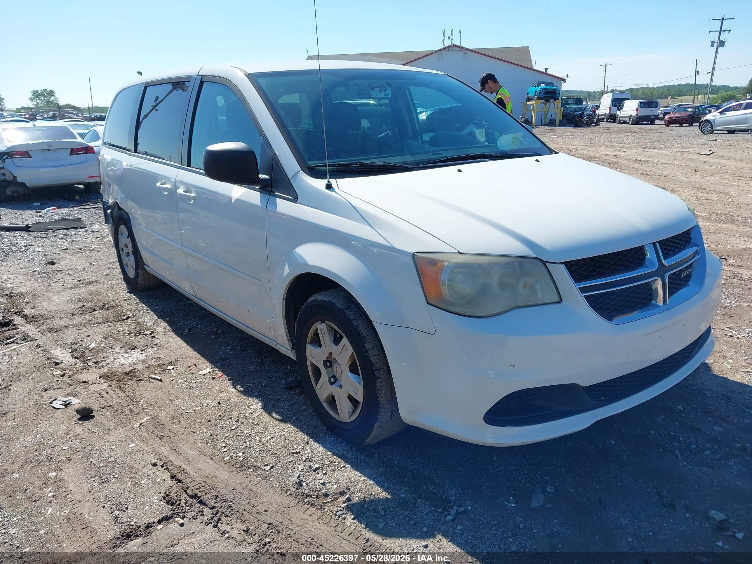 2012 Dodge Grand Caravan American Value, VIN 2C4RDGBG0CR142938 — Side