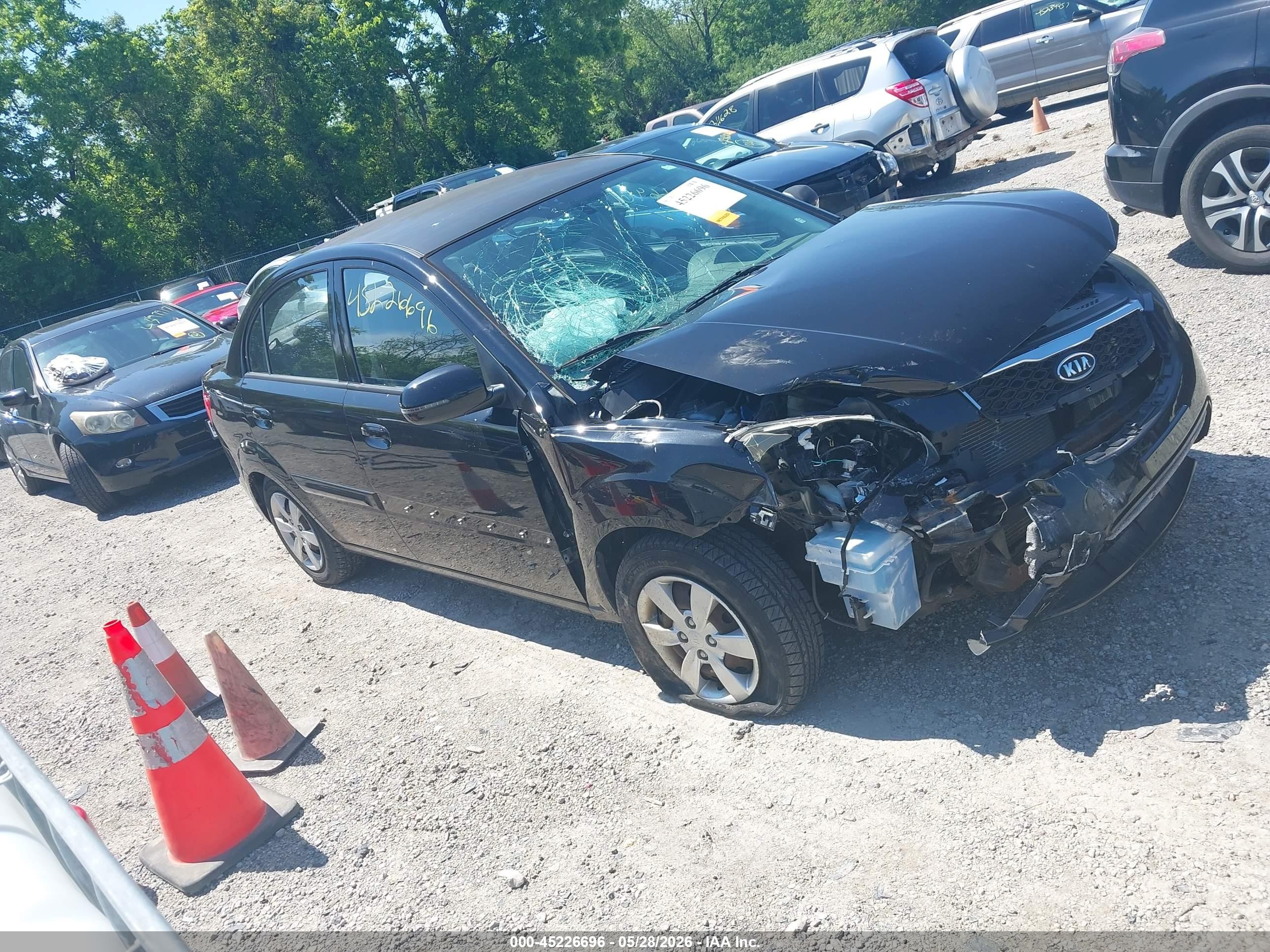 2011 Kia Rio LX, VIN KNADH4A37B6868679 — Перед