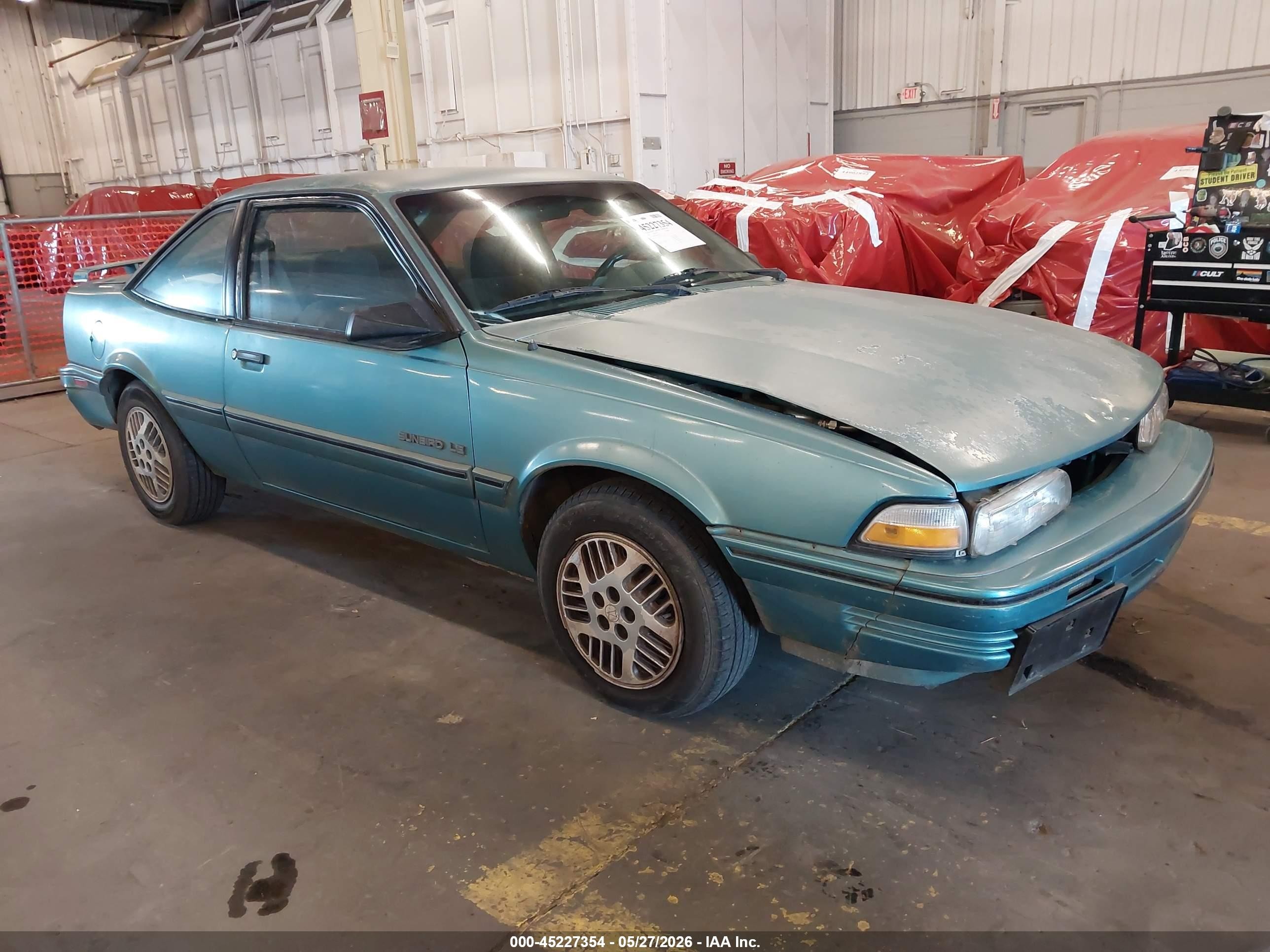 1994 Pontiac Sunbird, VIN 1G2JB14H9R7597047 — Front end