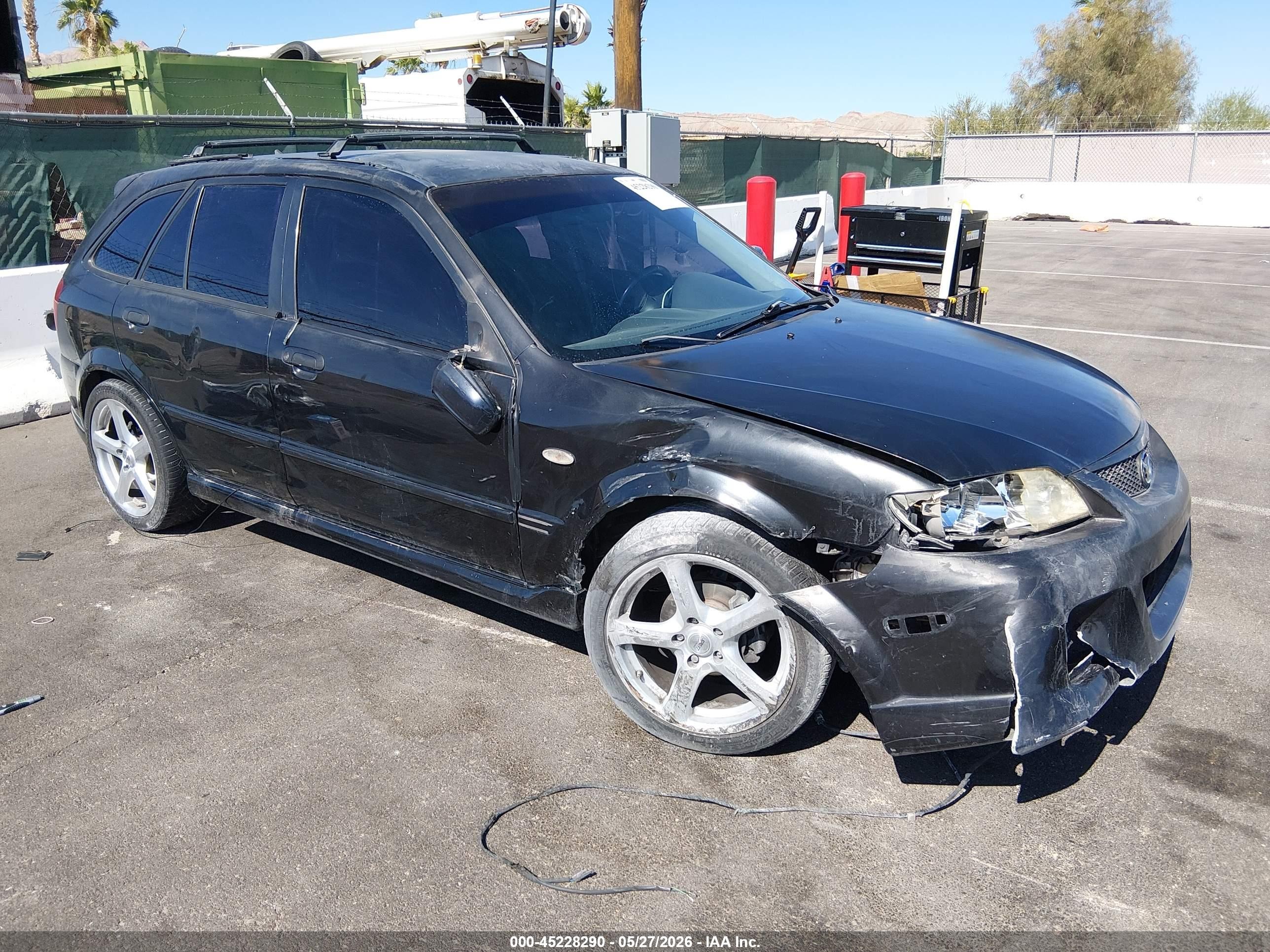 2002 Mazda Protege, VIN JM1BJ245321637372 — Side