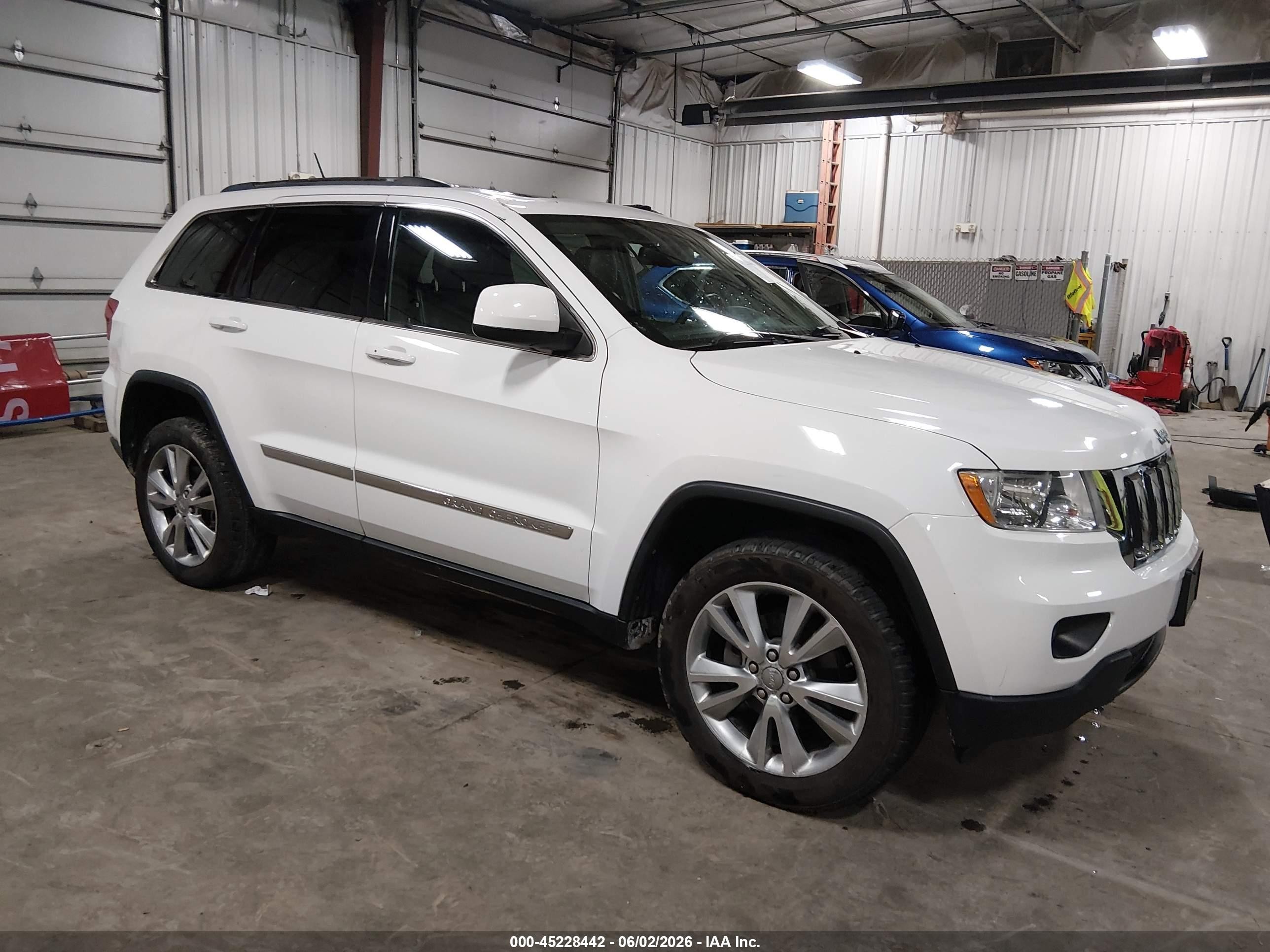 2013 Jeep Grand Cherokee Laredo, VIN 1C4RJFAG7DC641430 — Hail