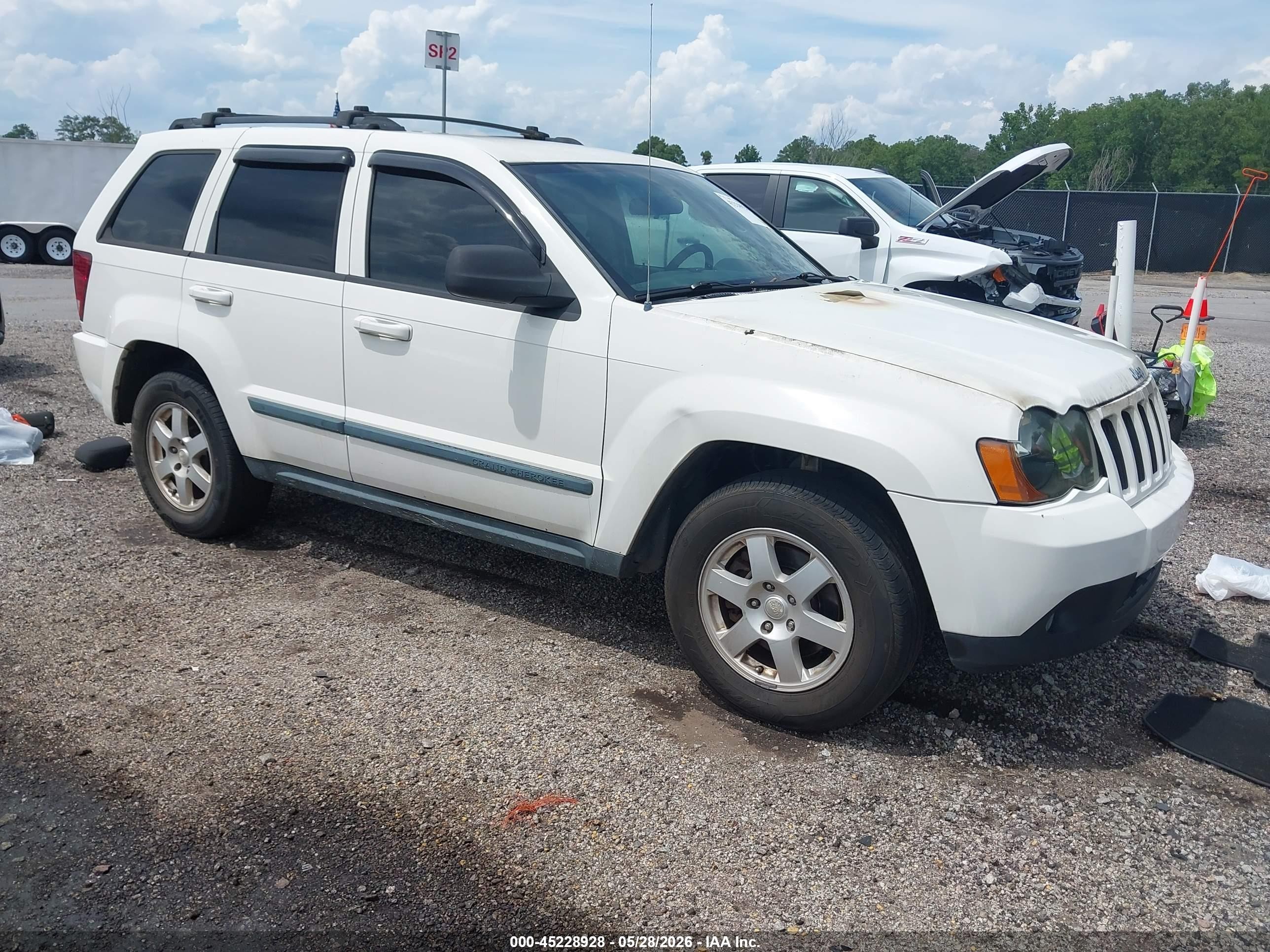 2009 Jeep Grand Cherokee Laredo, VIN 1J8GS48K69C503669 — Engine fire
